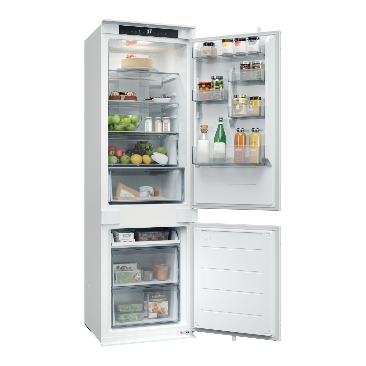 Refrigerador blanco abierto lleno de alimentos como frutas, frascos, pasteles y botellas. Las puertas están abiertas.