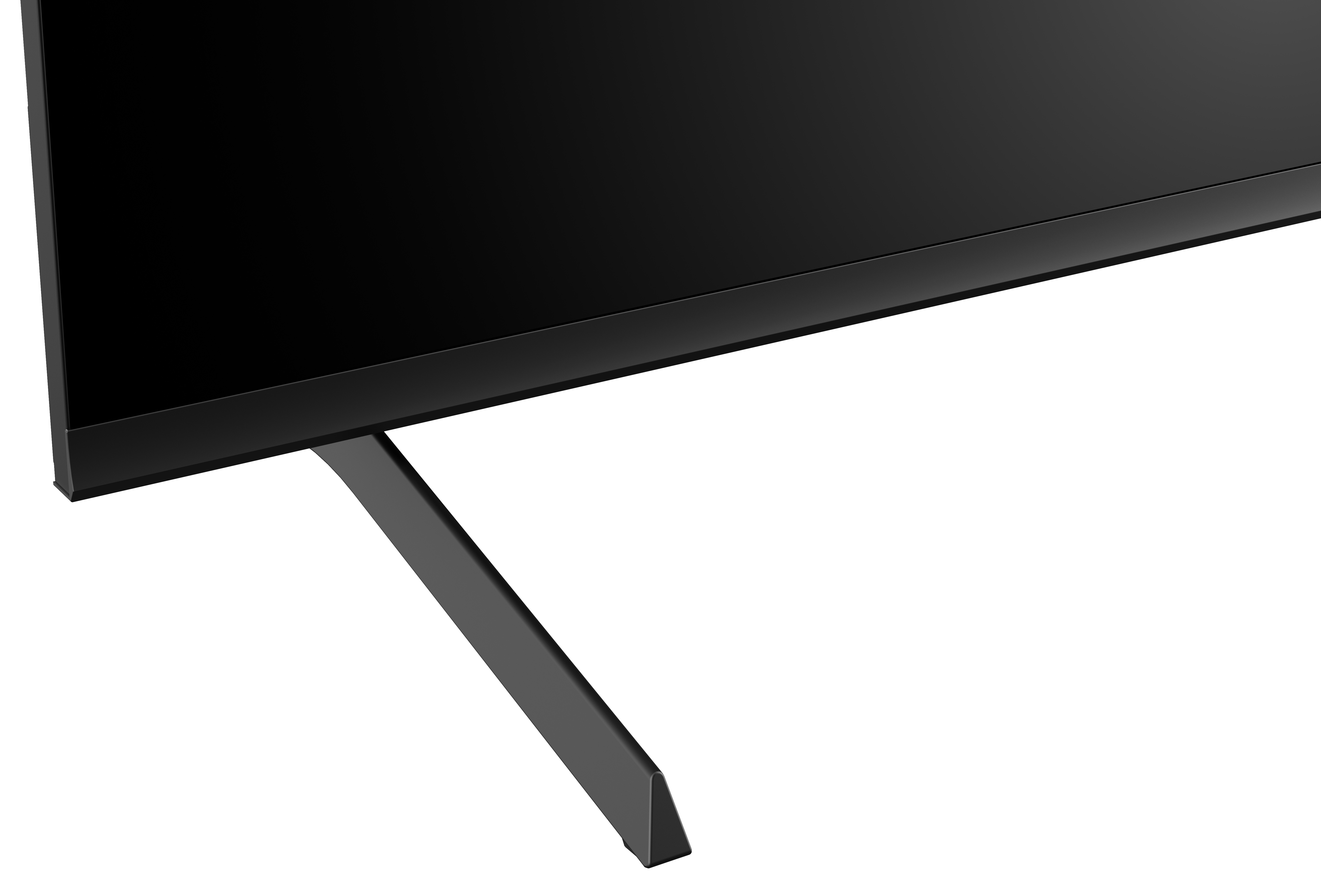 Widoczny jest czarny ekran telewizora. Spoczywa na ciemnoszarej podstawie, z białym tłem.