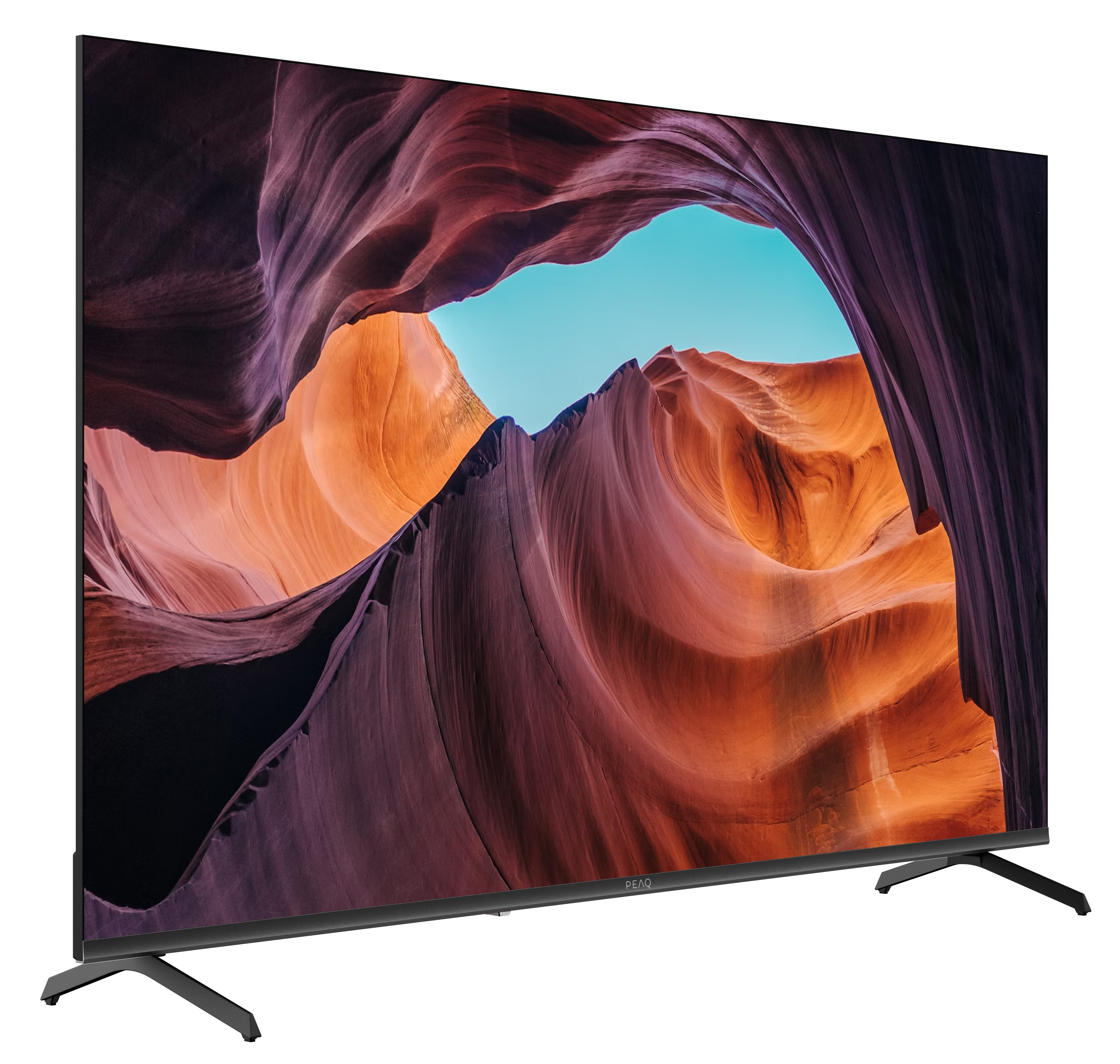 Telewizor z płaskim ekranem wyświetla scenę kanionu z pomarańczowymi i fioletowymi formacjami skalnymi oraz błękitnym niebem. Telewizor ma czarne nogi.