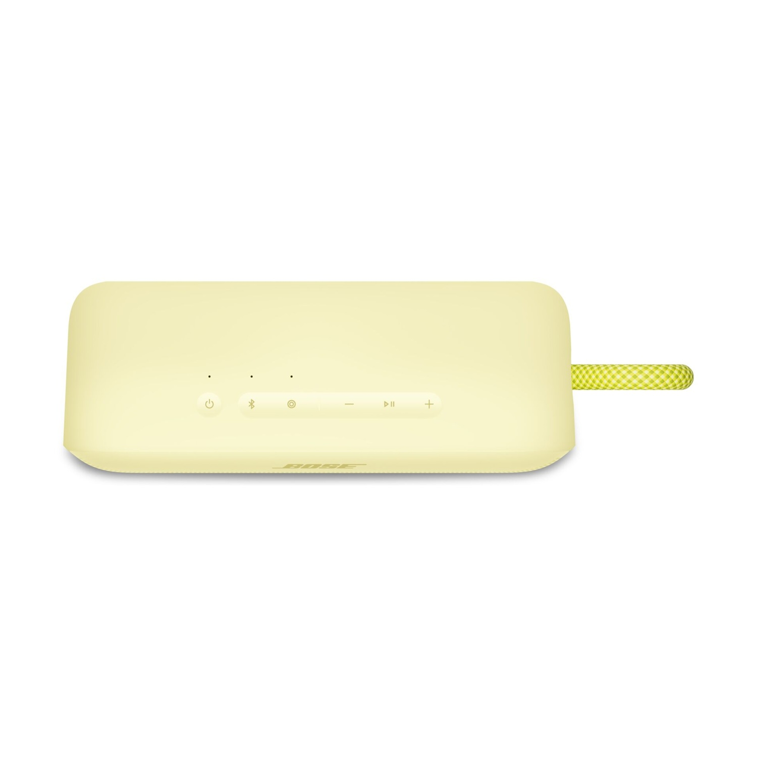 Un altoparlante Bose giallo chiaro con pulsanti e un cinturino a scacchi verdi su sfondo bianco.