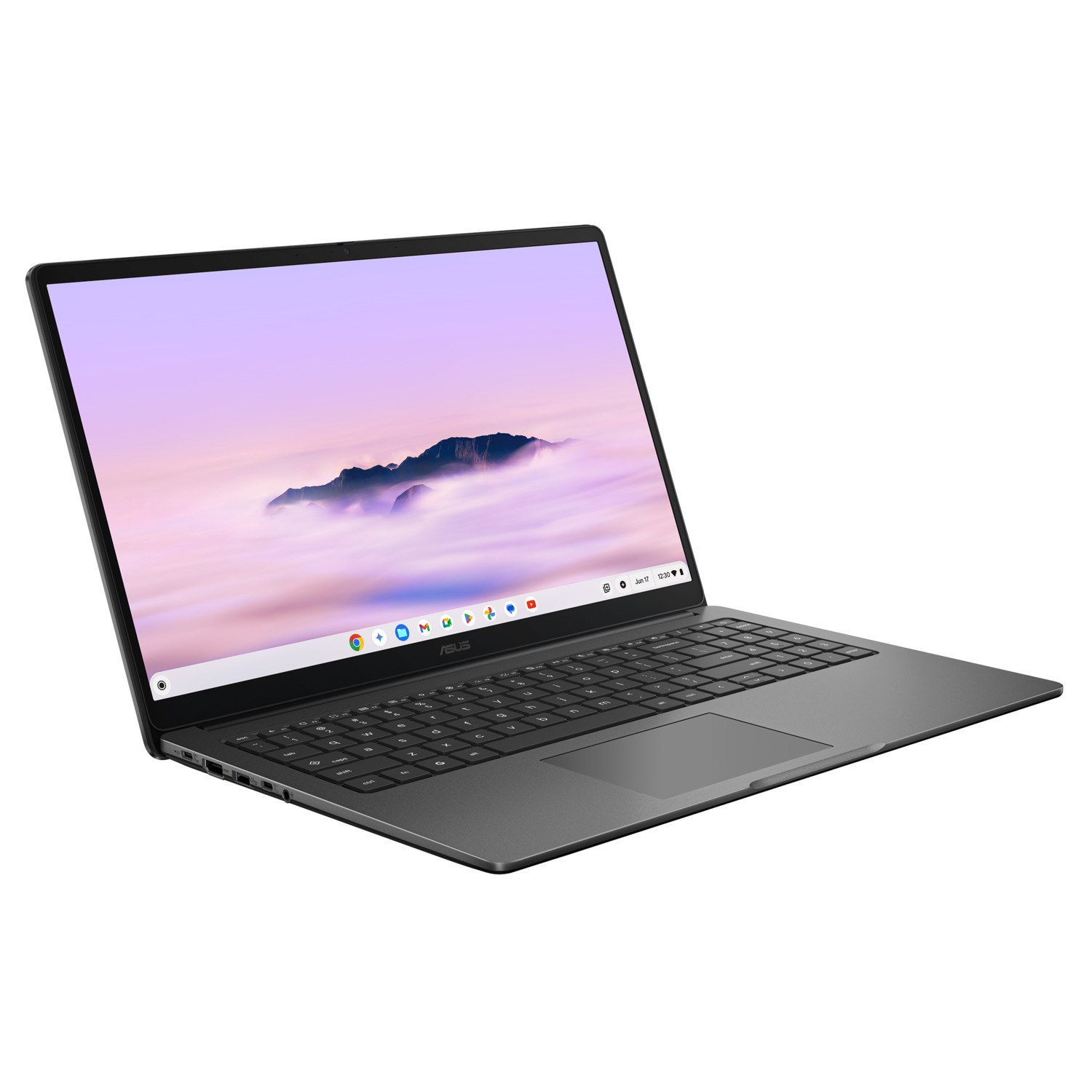 A black Asus laptop is open, displaying a mountain scene on the screen. The keyboard is visible, and the background is white.