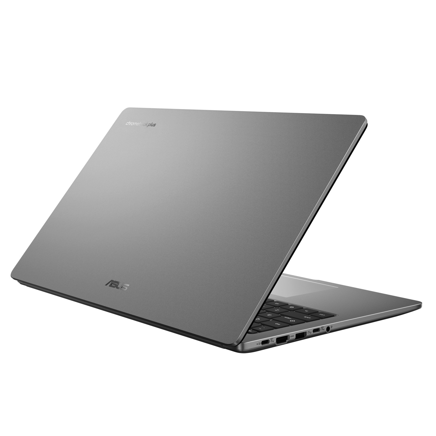 A gray ASUS Chromebook Plus laptop is slightly open. The keyboard is visible. The brand name is on the top left of the lid.