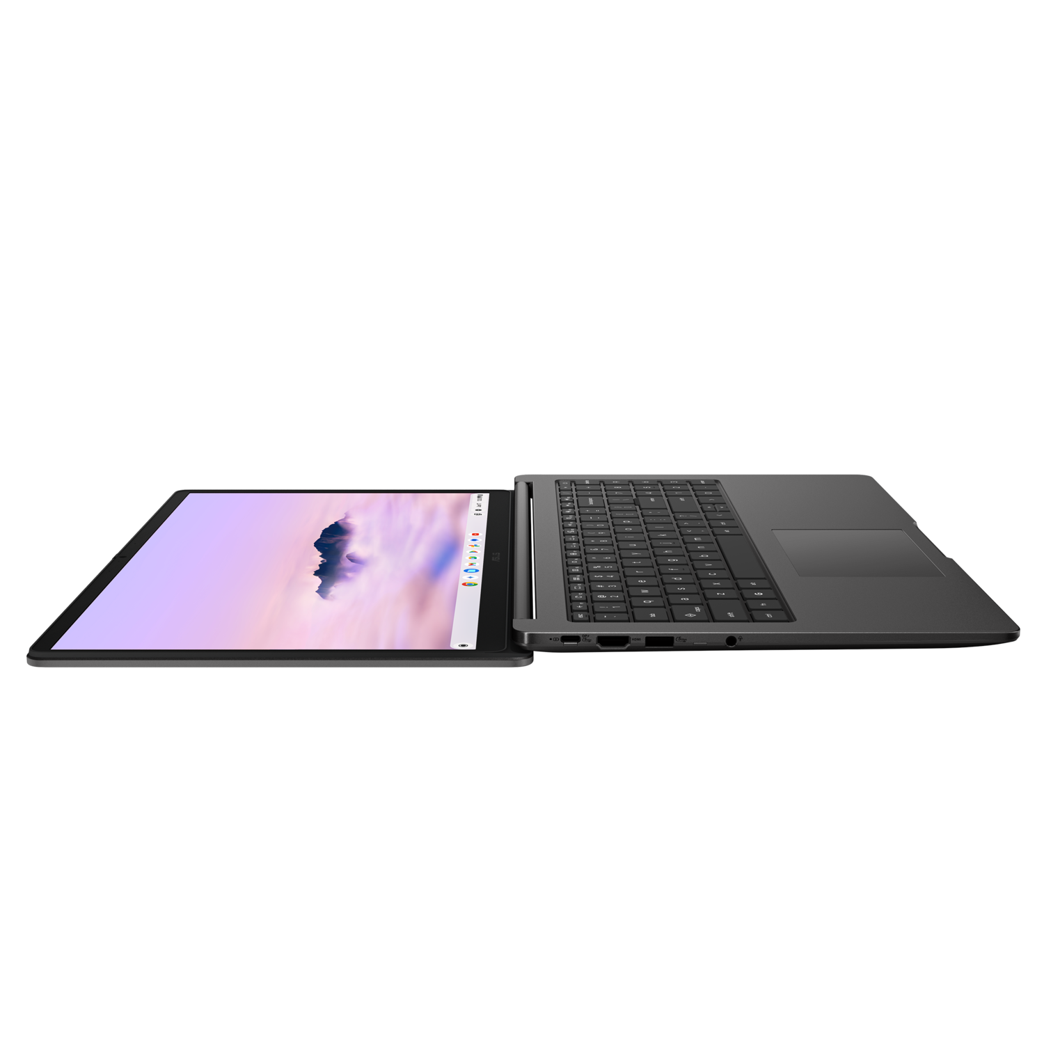 A gray laptop is open. The screen displays a sky with clouds. Keyboard and touchpad are visible.