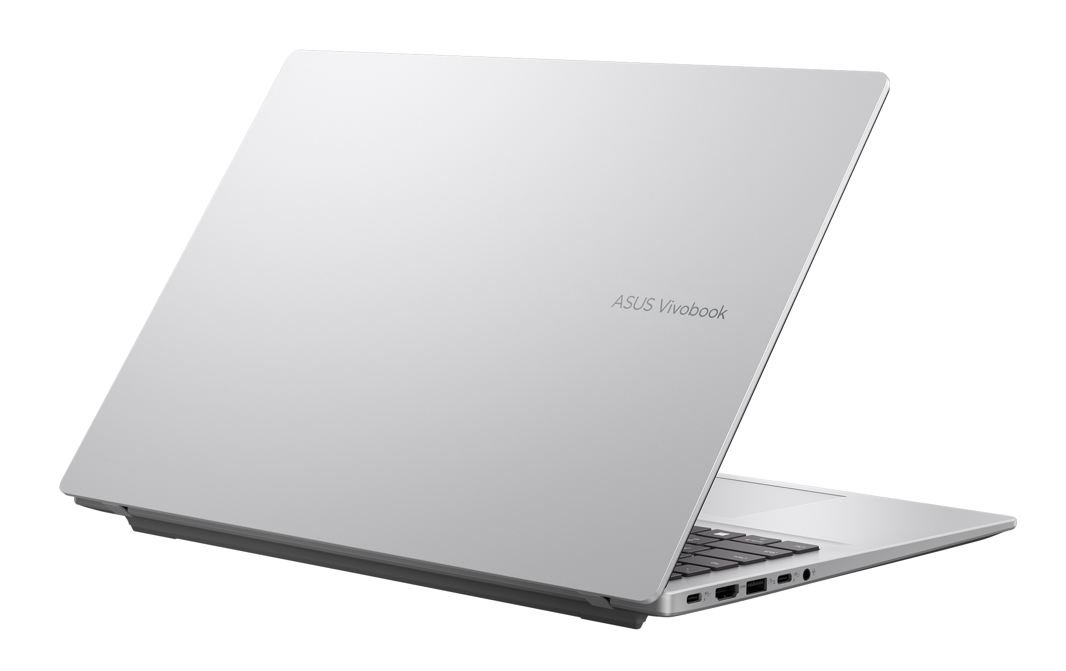 Srebrny laptop ASUS Vivobook jest lekko otwarty na czarnym tle. Widoczna jest klawiatura i porty.