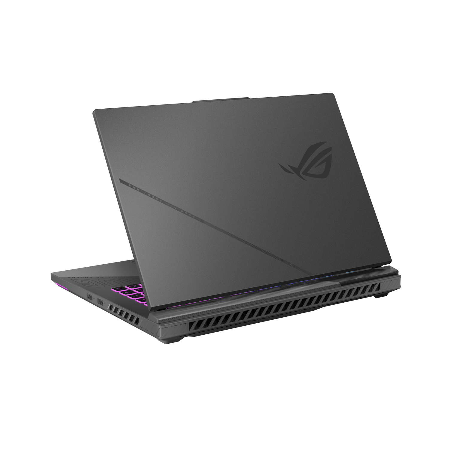 A dark gray laptop is slightly open. The keyboard glows with pink and purple lights. The ROG logo is visible on the lid.