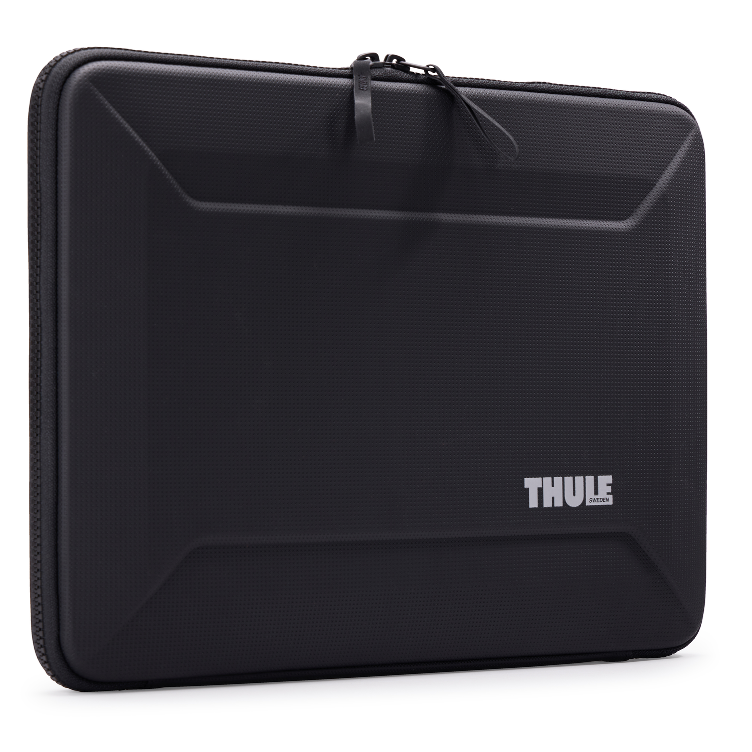 A black Thule laptop sleeve. It is rectangular, with a zipper closure and a textured surface. The Thule logo is visible.