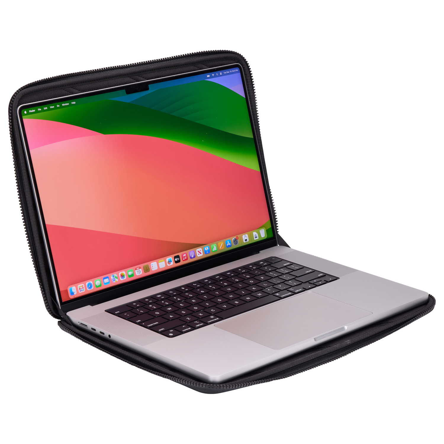 A silver laptop in a black case is open. The screen displays a colorful background with various app icons at the bottom.