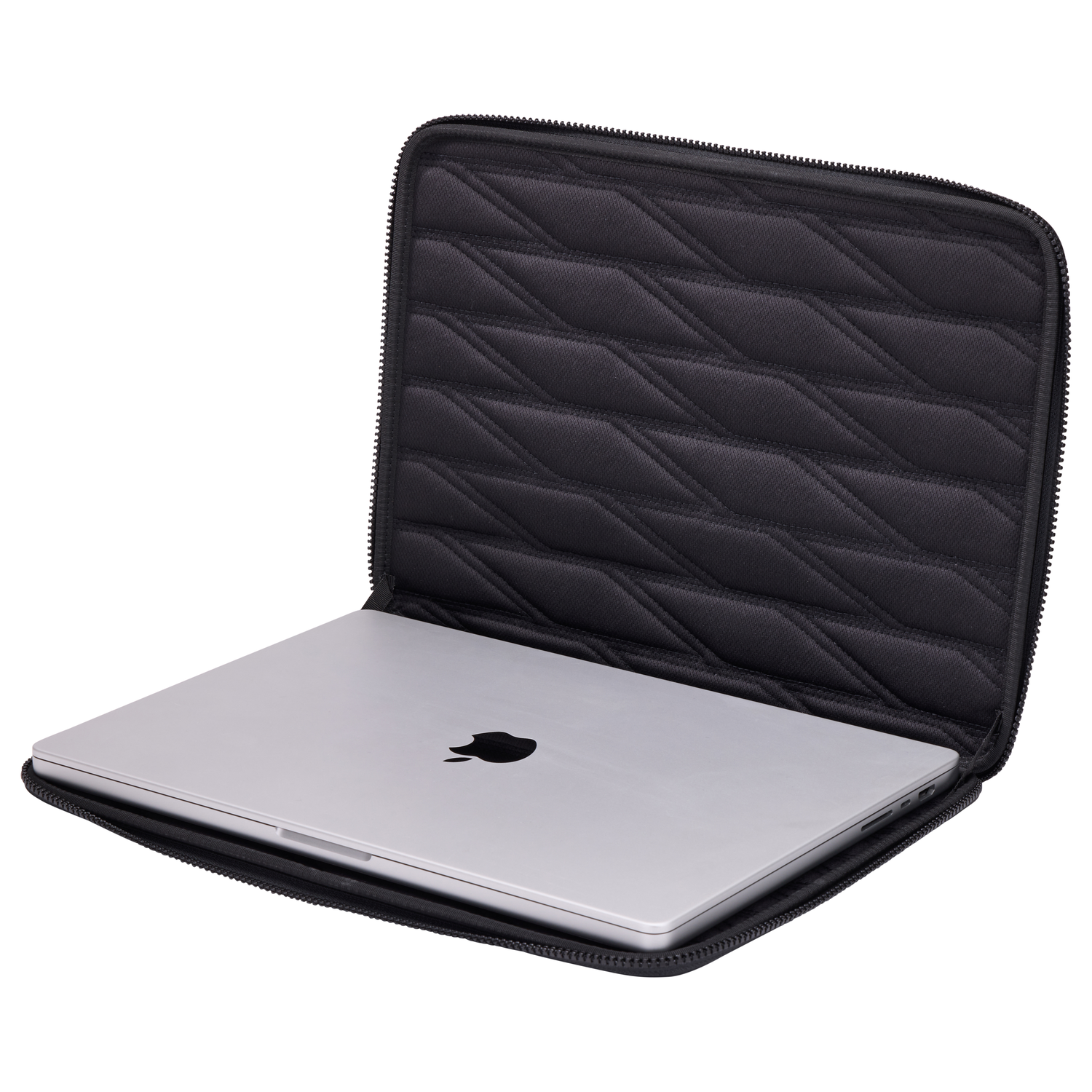 A silver laptop with the Apple logo is in a black quilted case. The case is open, and a zipper is visible.