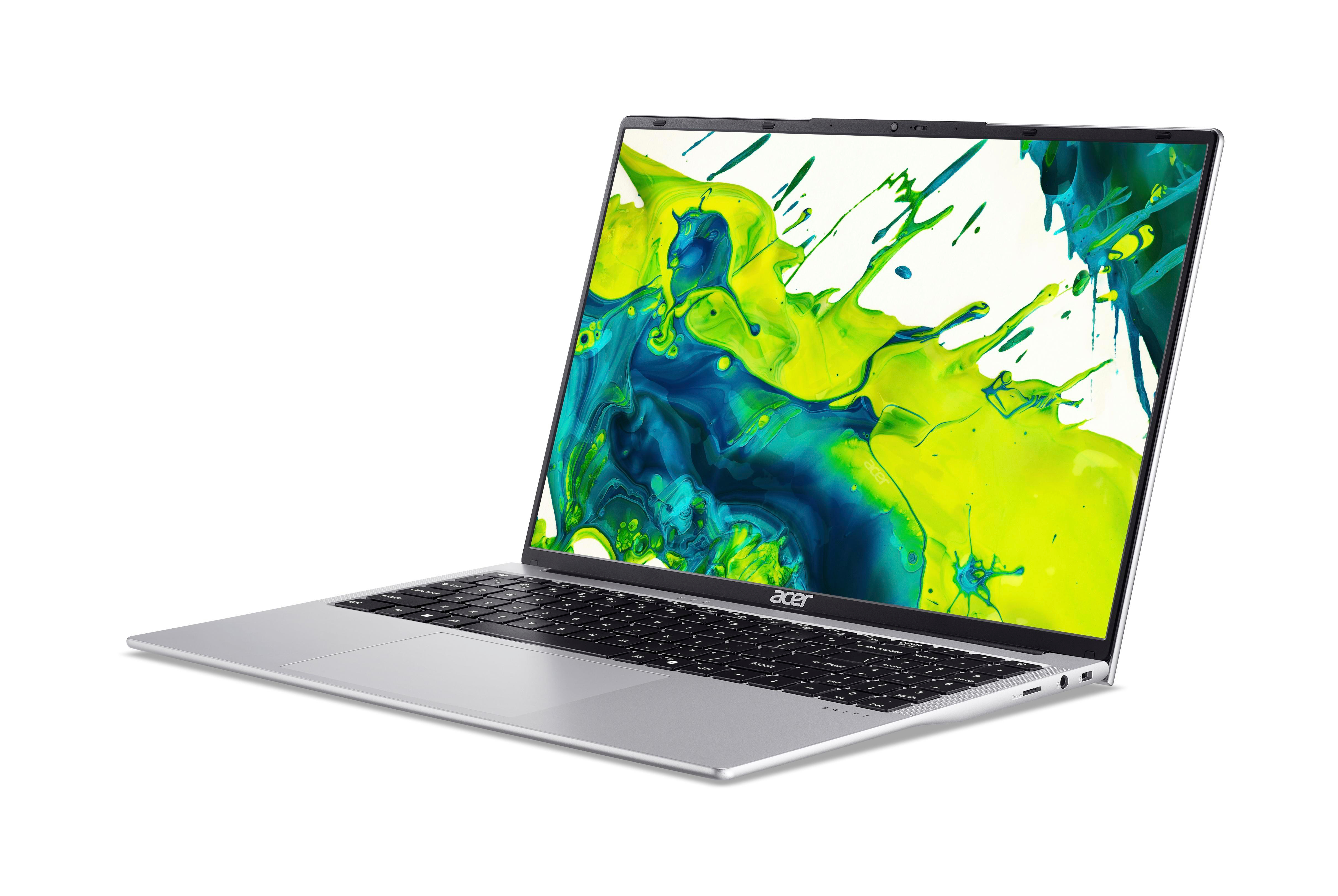 Silberner Acer-Laptop. Bildschirm zeigt gelbes und blaues Farbspritzer-Design. Tastatur sichtbar. Weißer Hintergrund.