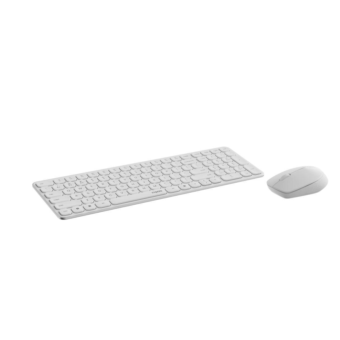 Ein weißes Tastatur- und Maus-Set auf weißem Hintergrund. Die Tastatur hat ein Standardlayout, und die Maus ist kompakt.