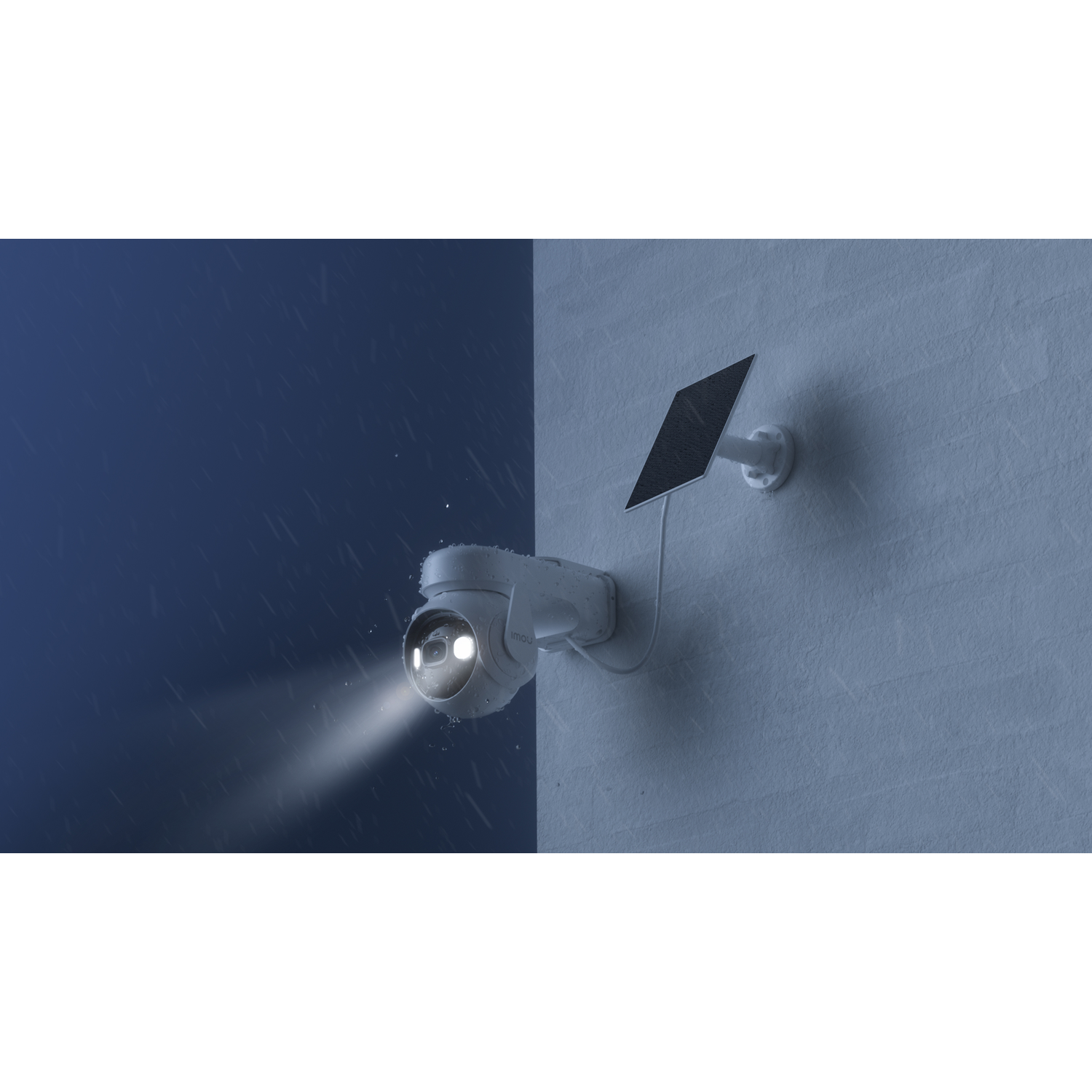 A white security camera with a solar panel is mounted on a blue wall. Rain is falling. The camera's light is on.