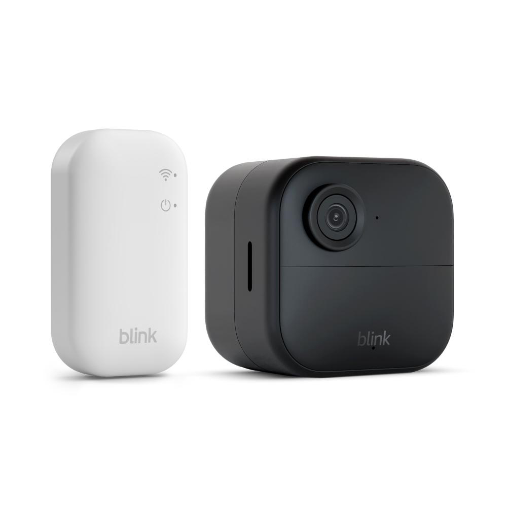 Ein weißes Blink-Gerät und eine schwarze Blink-Kamera auf weißem Hintergrund. Beide Geräte haben das Blink-Logo.