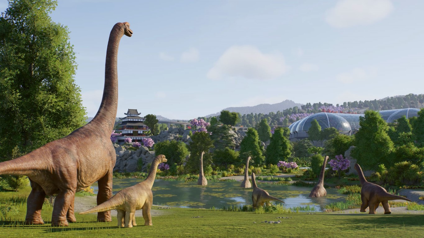 Kilka dinozaurów Brachiosaurus w parku. Niektóre są w stawie, inne na trawie. Budynek w stylu japońskim znajduje się w tle.