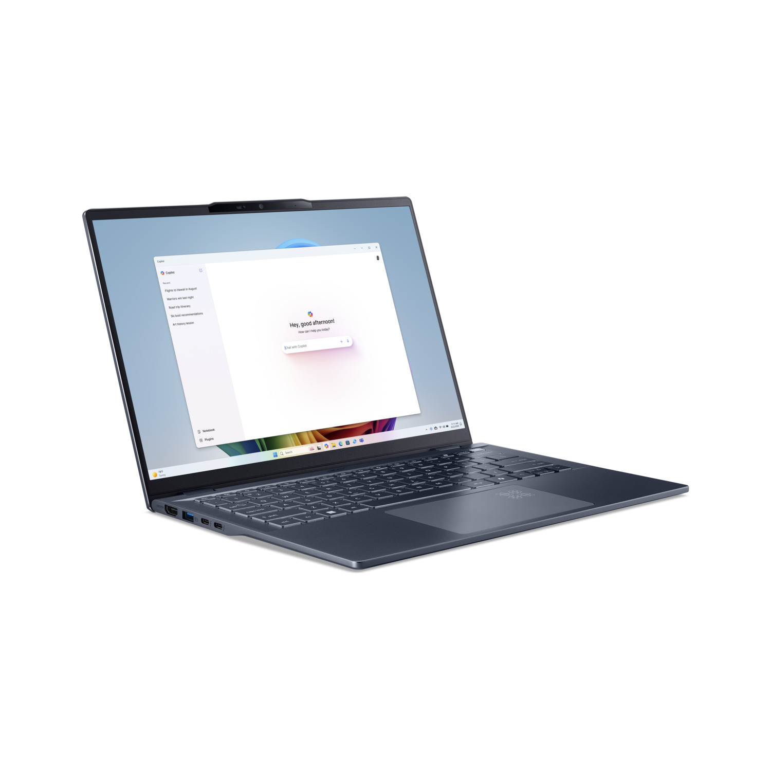 A blue laptop is open on a white surface. The screen displays a chat window with the text: Hey, good afternoon! How can I help you today?