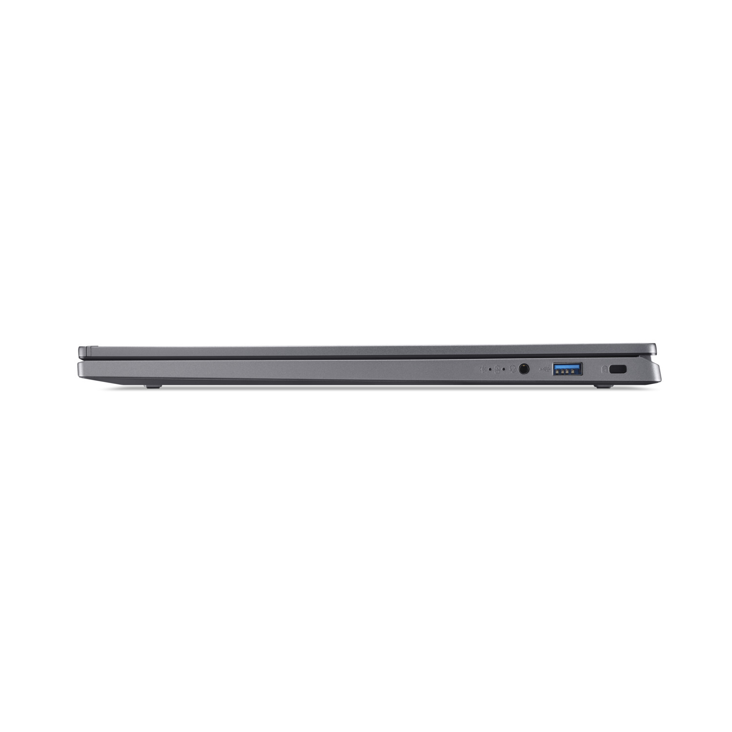 Vue latérale d'un ordinateur portable gris. Les ports sont visibles, notamment USB et audio. L'ordinateur est fermé.