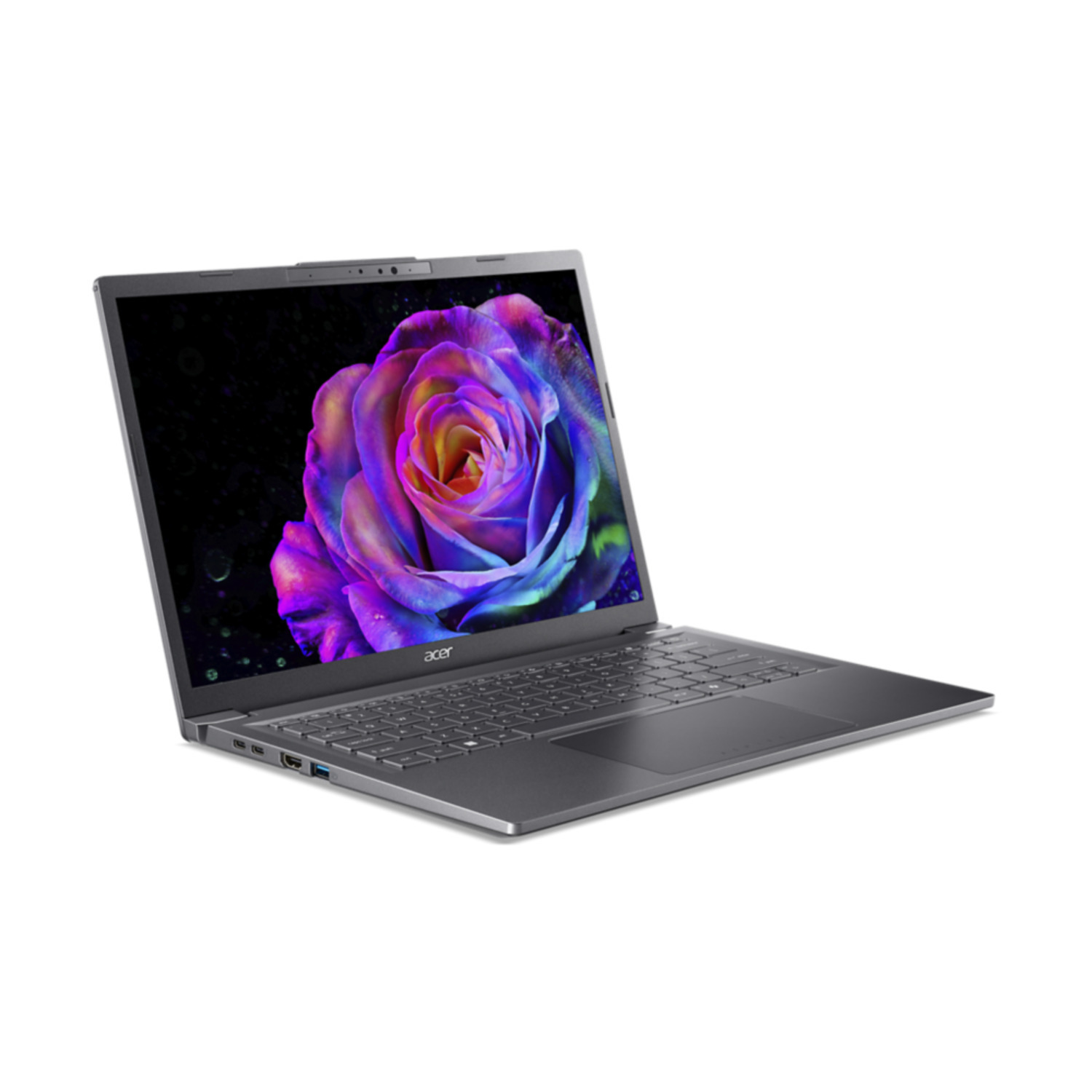 A grey Acer laptop displays a colorful rose image on the screen. The laptop is on a white surface.