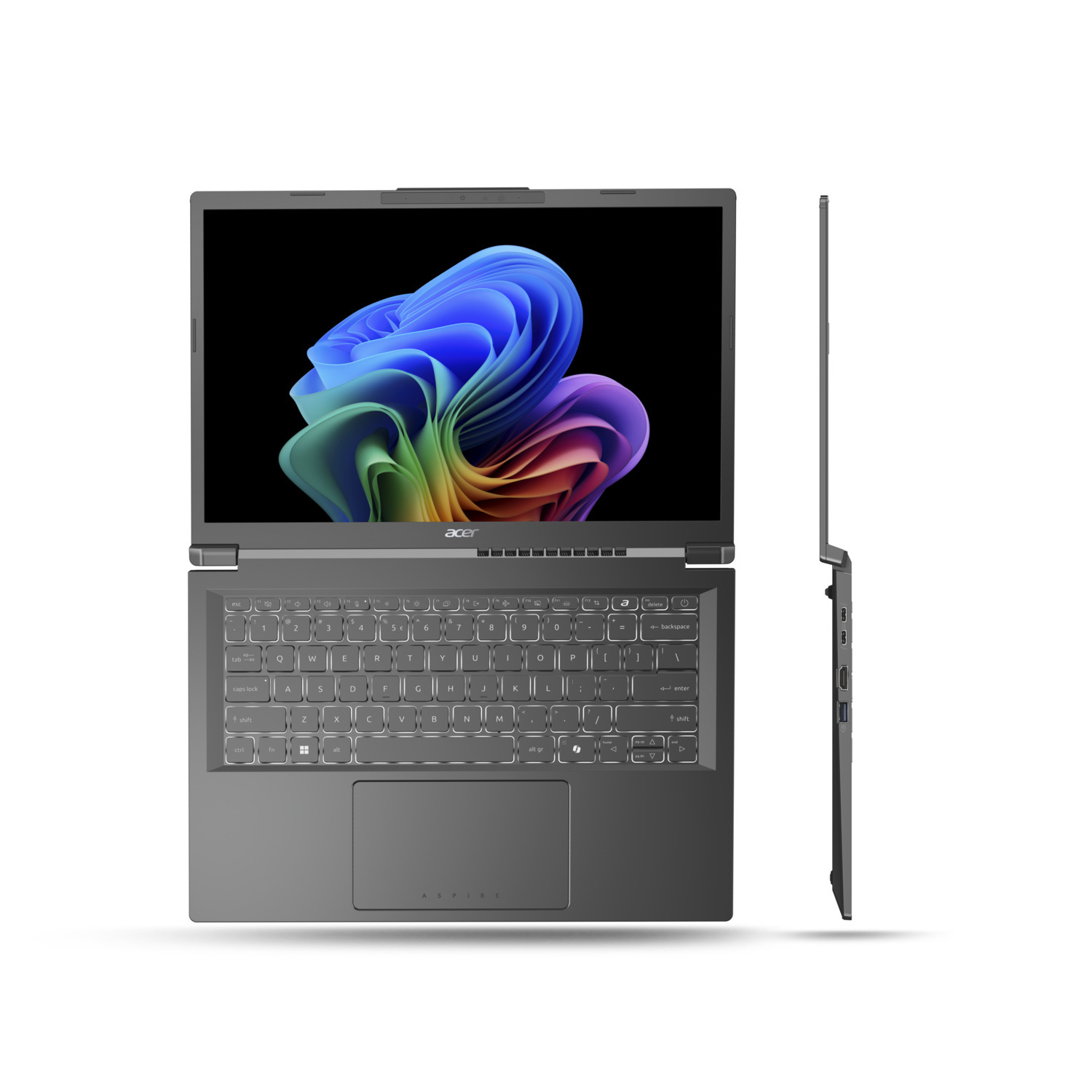 A grey Acer laptop is displayed open, showcasing a colorful abstract image on the screen. The side view shows the laptop's thin profile.