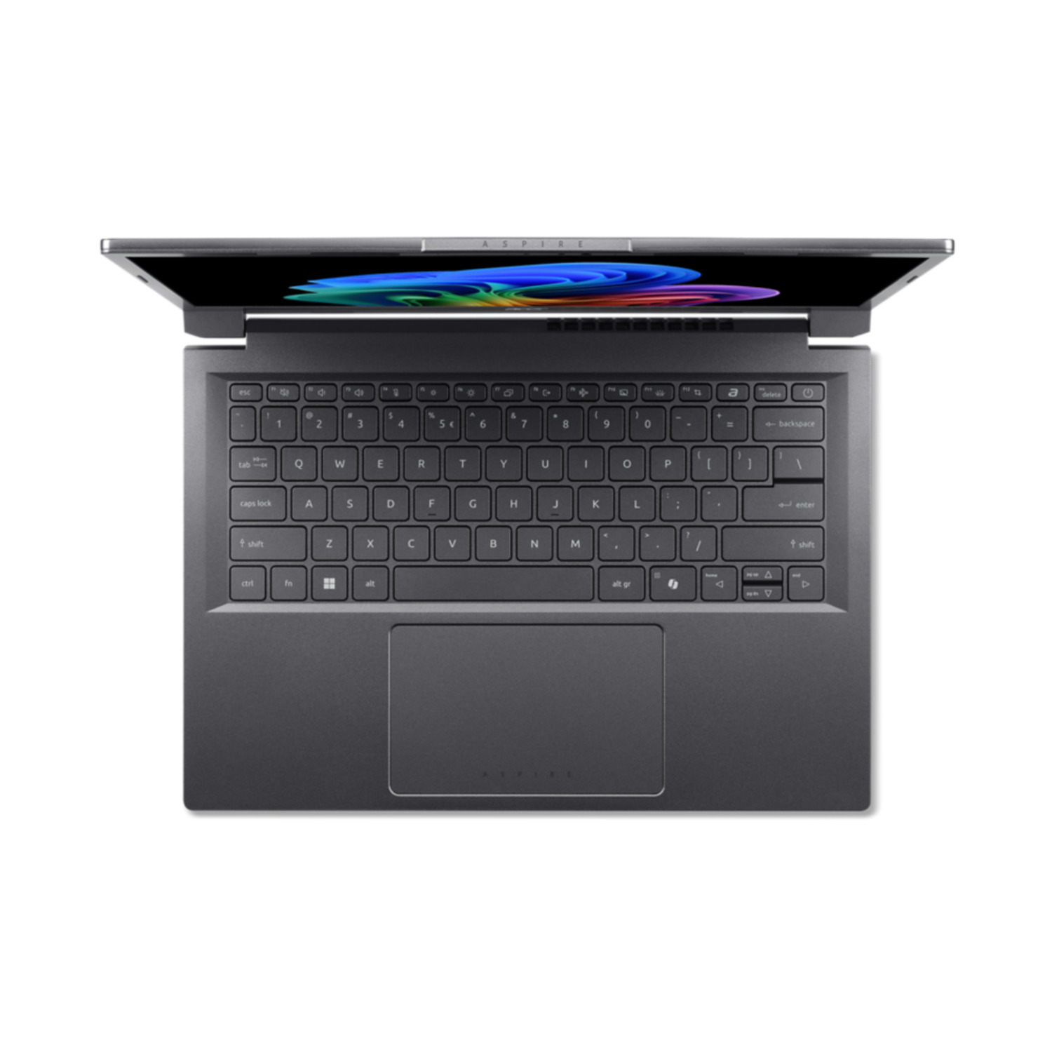 A gray laptop is open, showing the keyboard and screen. The screen displays a colorful image. The laptop is on a white surface.