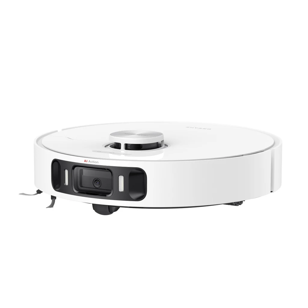 Egy fehér robotporszívó. Kör alakú, fekete és ezüst részletekkel. Az elején kamera és érzékelők találhatók.