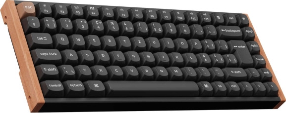 Eine mechanische Tastatur mit schwarzen Tasten und Holzrahmen. Die Tasten sind mit Buchstaben, Zahlen und Symbolen beschriftet.