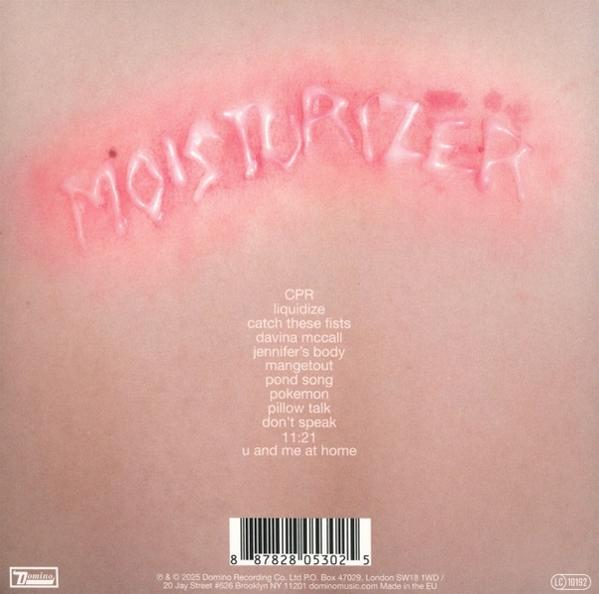 A pinkish skin background with the word "MOISTURIZER" carved into it. Below, a list of song titles is visible.