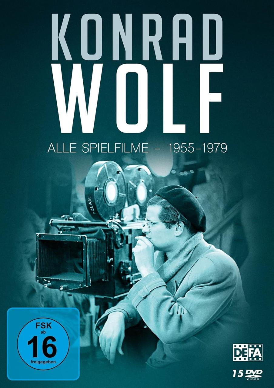 Filmposter für Konrad Wolf. Es zeigt einen Mann mit Brille, eine Kamera und Text. Die Bewertung ist FSK ab 16.