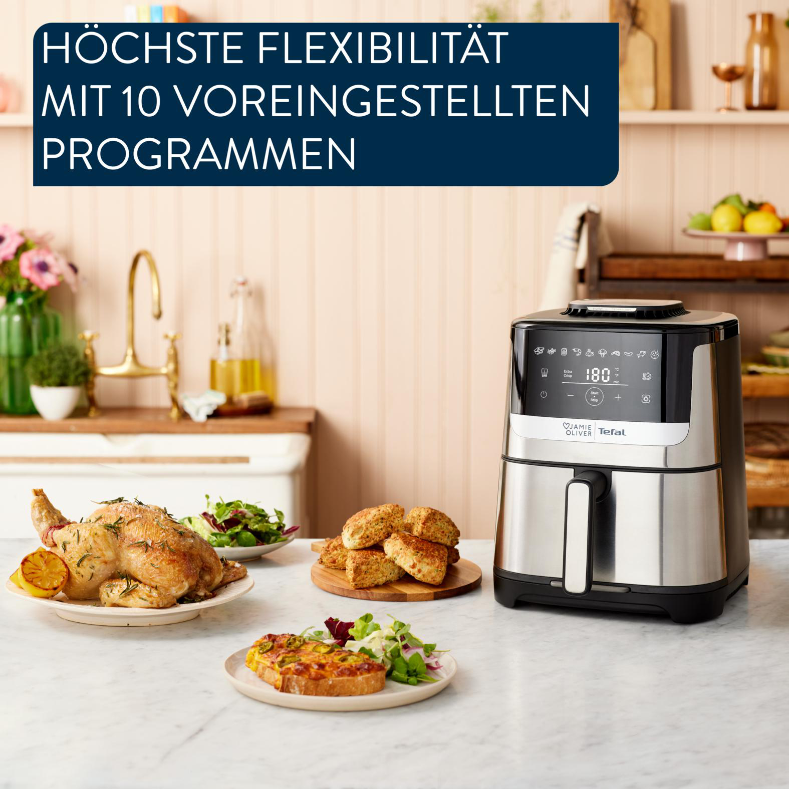 Ein Luftfritteuse mit Essen: Brathähnchen, Brot und ein Toast. Der Text lautet 'Höchste Flexibilität mit 10 Programmen'.