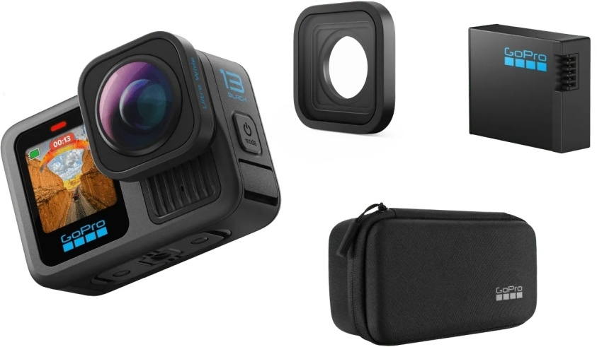 GoPro-Kamera mit Zubehör: eine schwarze Kamera, ein Rahmen, ein Akku und eine Tragetasche. Die Kamera zeigt eine malerische Aussicht.