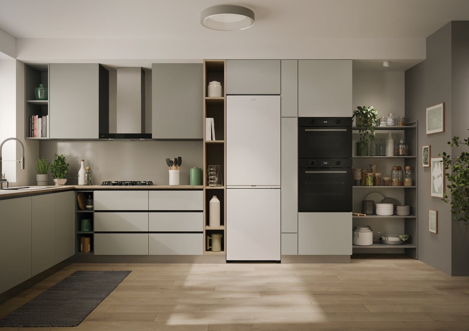 Cocina moderna con armarios grises, nevera blanca, horno negro, suelo de madera y varios utensilios de cocina.