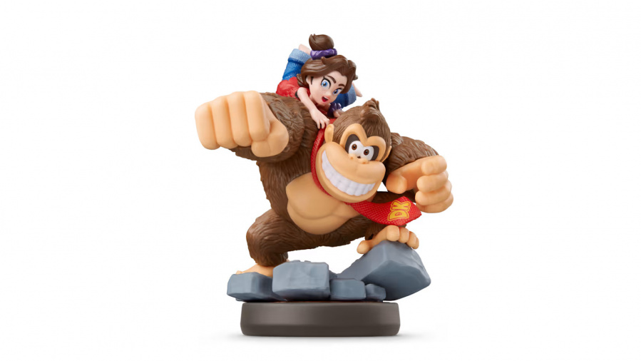 Figurka Donkey Kong z dziewczynką na plecach. Gorilla ma czerwony krawat, a dziewczynka brązowe włosy.