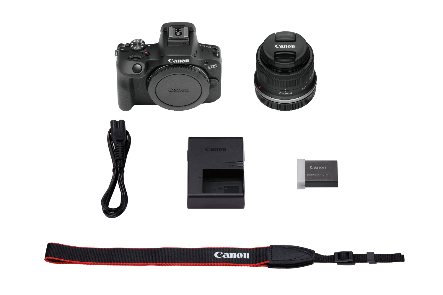 Una cámara Canon y accesorios, incluyendo una lente, cargador de batería, batería, correa y cable de alimentación, todo sobre un fondo blanco.