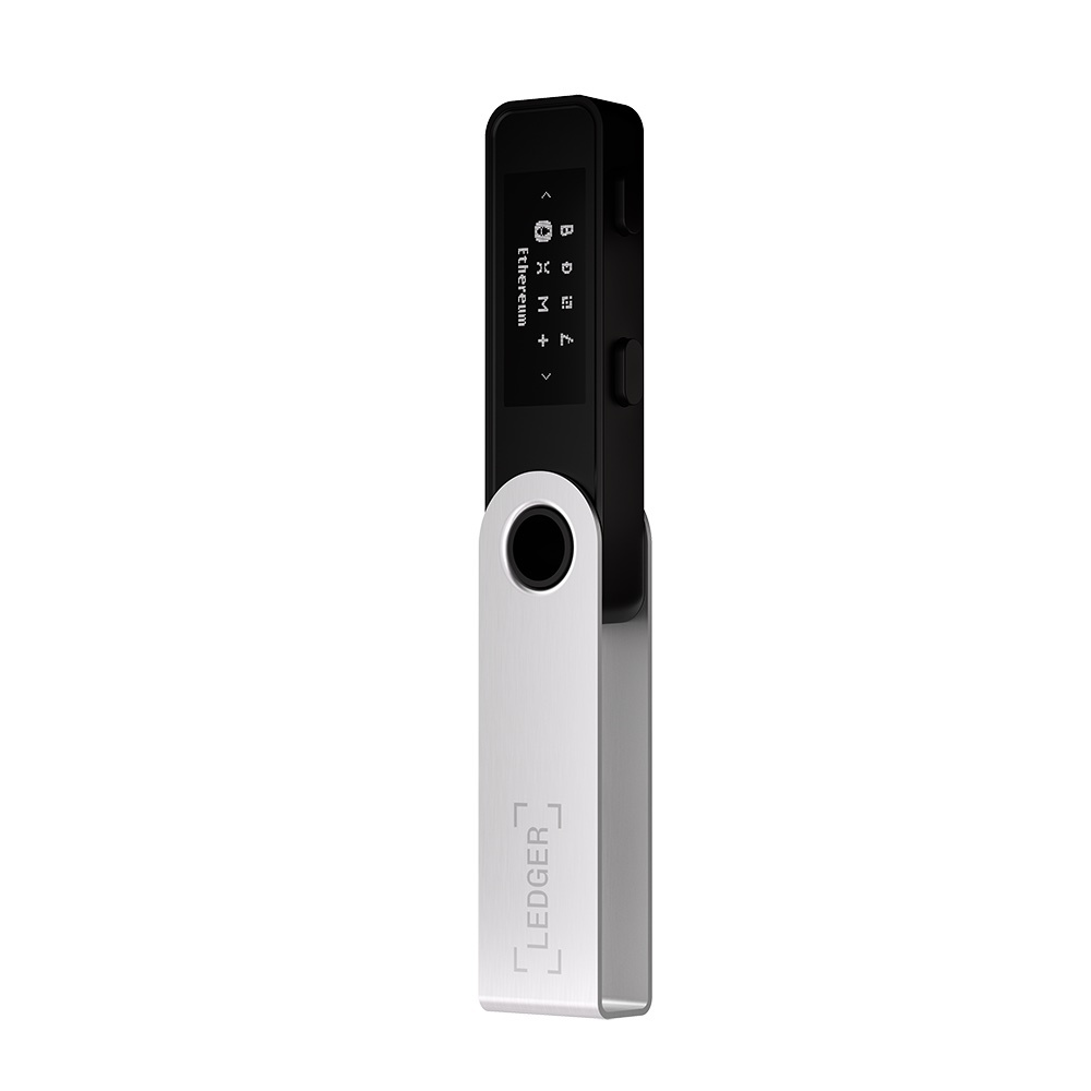 Una billetera de hardware Ledger. Tiene una parte superior negra y una inferior plateada con el logotipo de Ledger. La pantalla muestra información de criptomonedas.