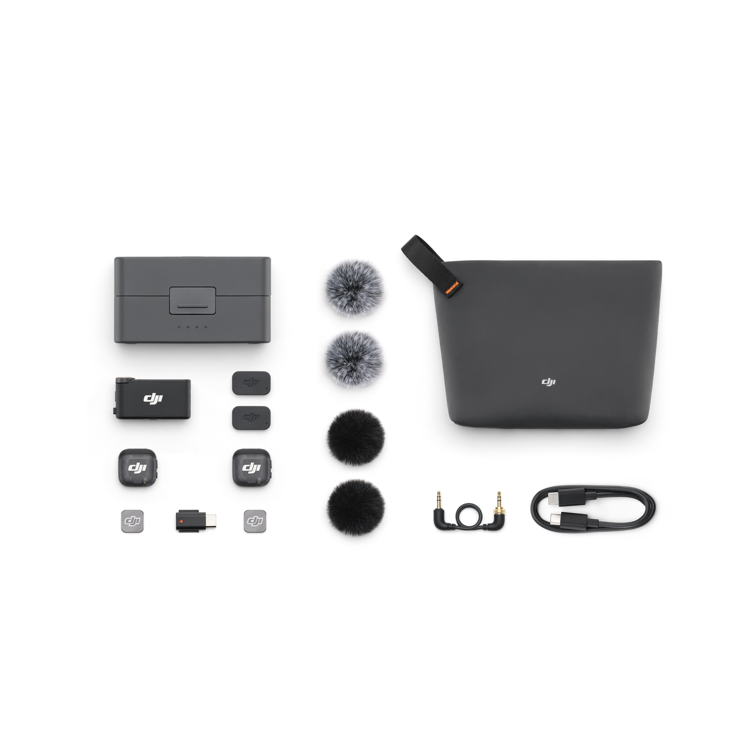 DJI microfoonkit op wit. Inclusief draagtas, oplaadcase, microfoons, windschermen en kabels.