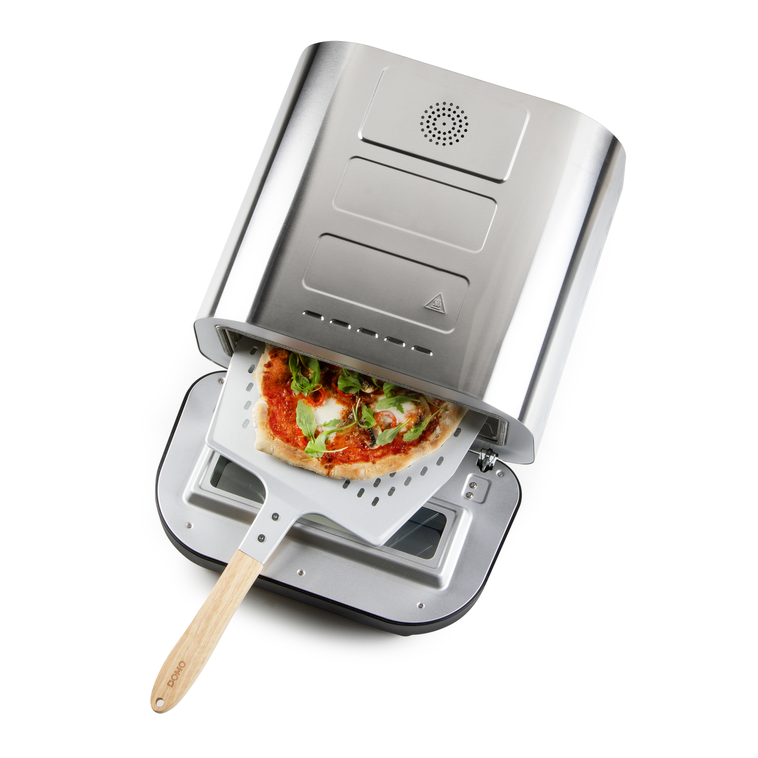 A pizza is being removed from a silver pizza oven with a pizza peel. The pizza has toppings and is on a white peel.