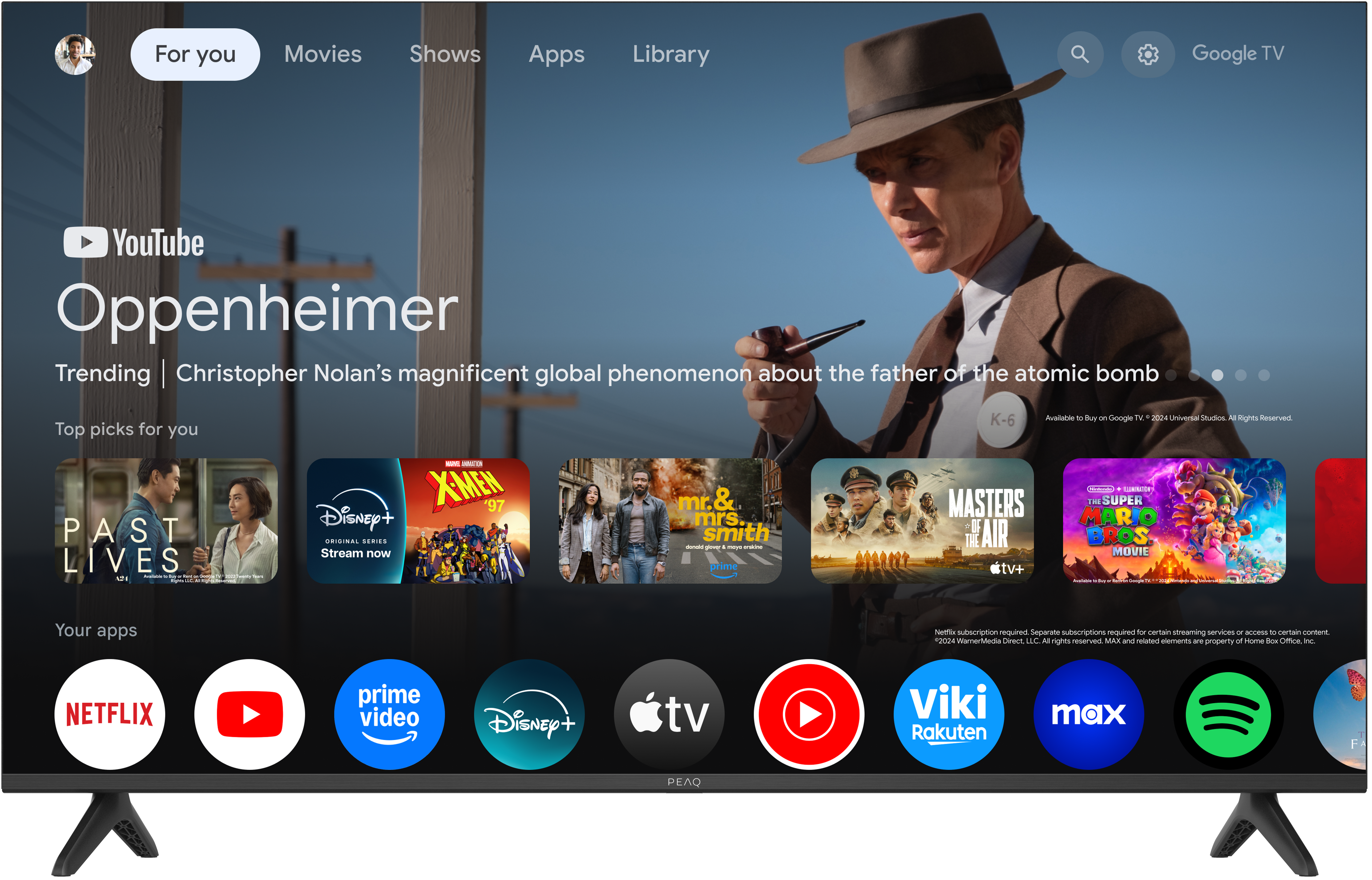 Ein Fernseher zeigt den Film Oppenheimer. Darunter befinden sich App-Symbole wie Netflix, YouTube und Disney+.