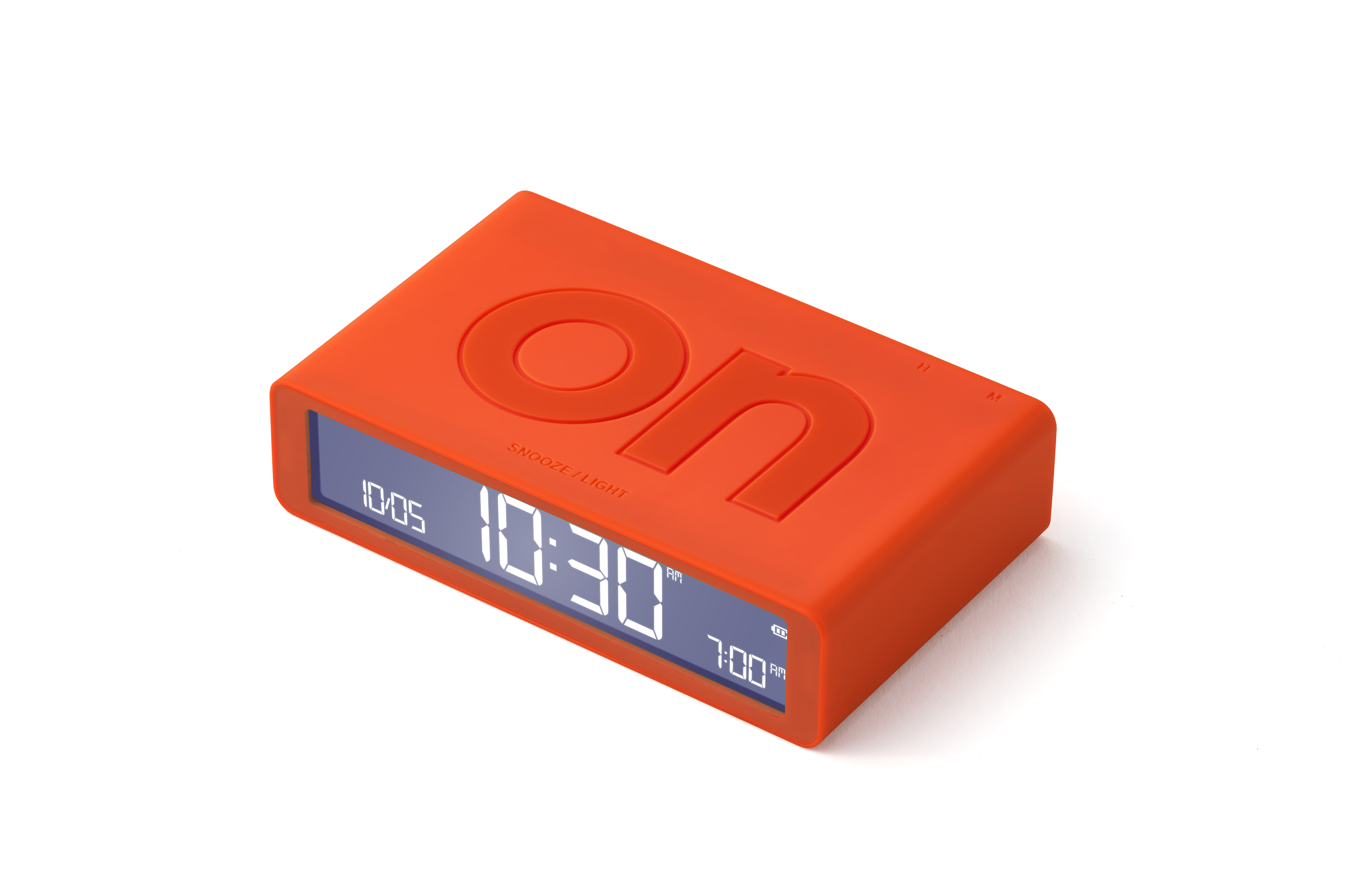 Ein orangefarbener Wecker zeigt 10:30 Uhr an. Das Wort 'on' steht oben. Snooze/Light steht auf dem Zifferblatt.