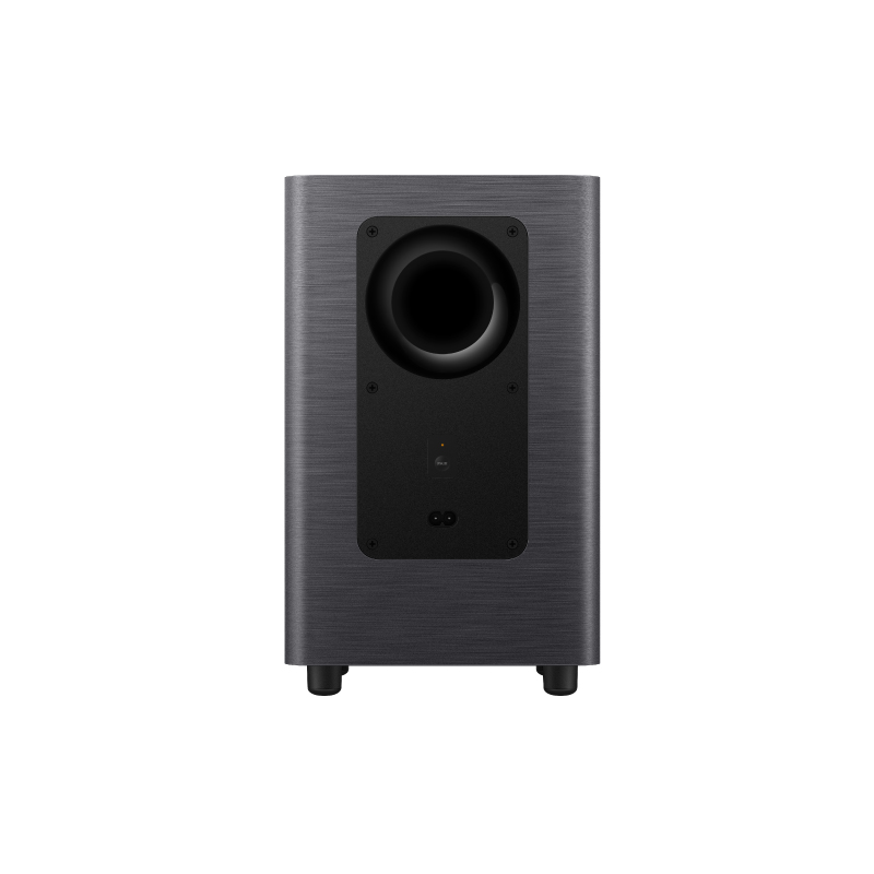 Koyu gri bir subwoofer dik duruyor. Büyük dairesel bir açıklığı, siyah bir kontrol paneli ve altta küçük ayakları var.