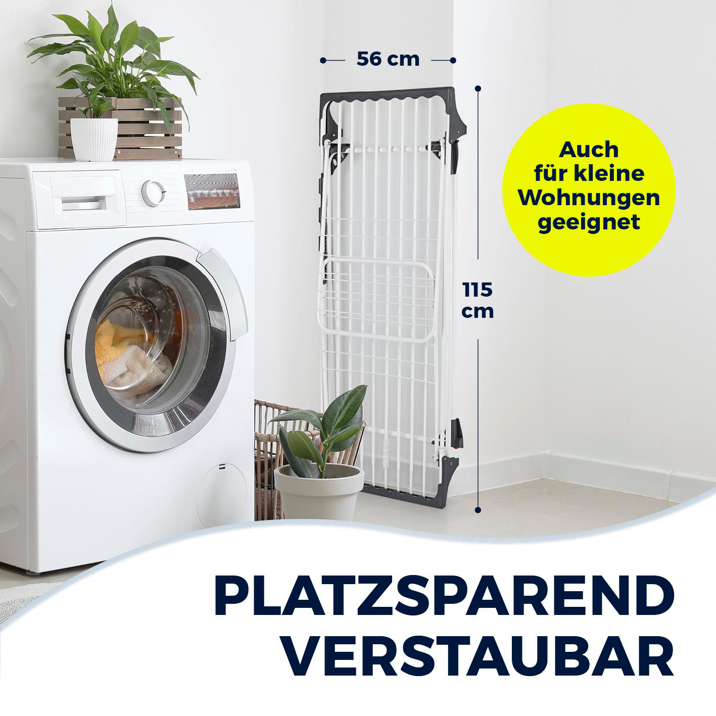 Eine Waschmaschine, ein Wäscheständer und Pflanzen befinden sich in einem Raum. Der Wäscheständer ist 115 cm hoch und 56 cm breit.