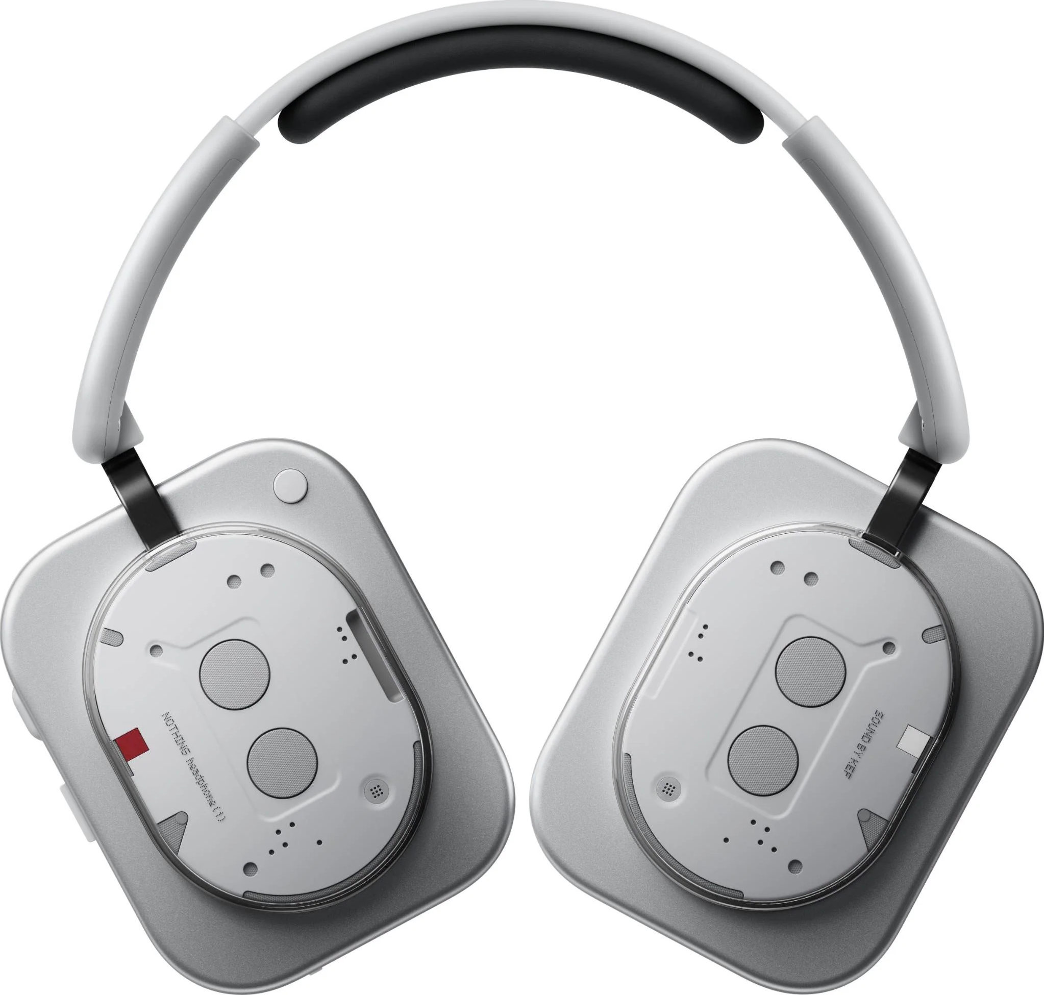 Casque circum-auriculaire, argent et blanc, avec une bande noire sur le dessus. Chaque écouteur a deux cercles et un carré rouge.