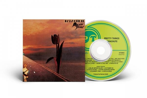 Albumcover mit einer Tulpe auf einer Straße, CD mit grünem Etikett. Sonnenuntergang im Hintergrund.