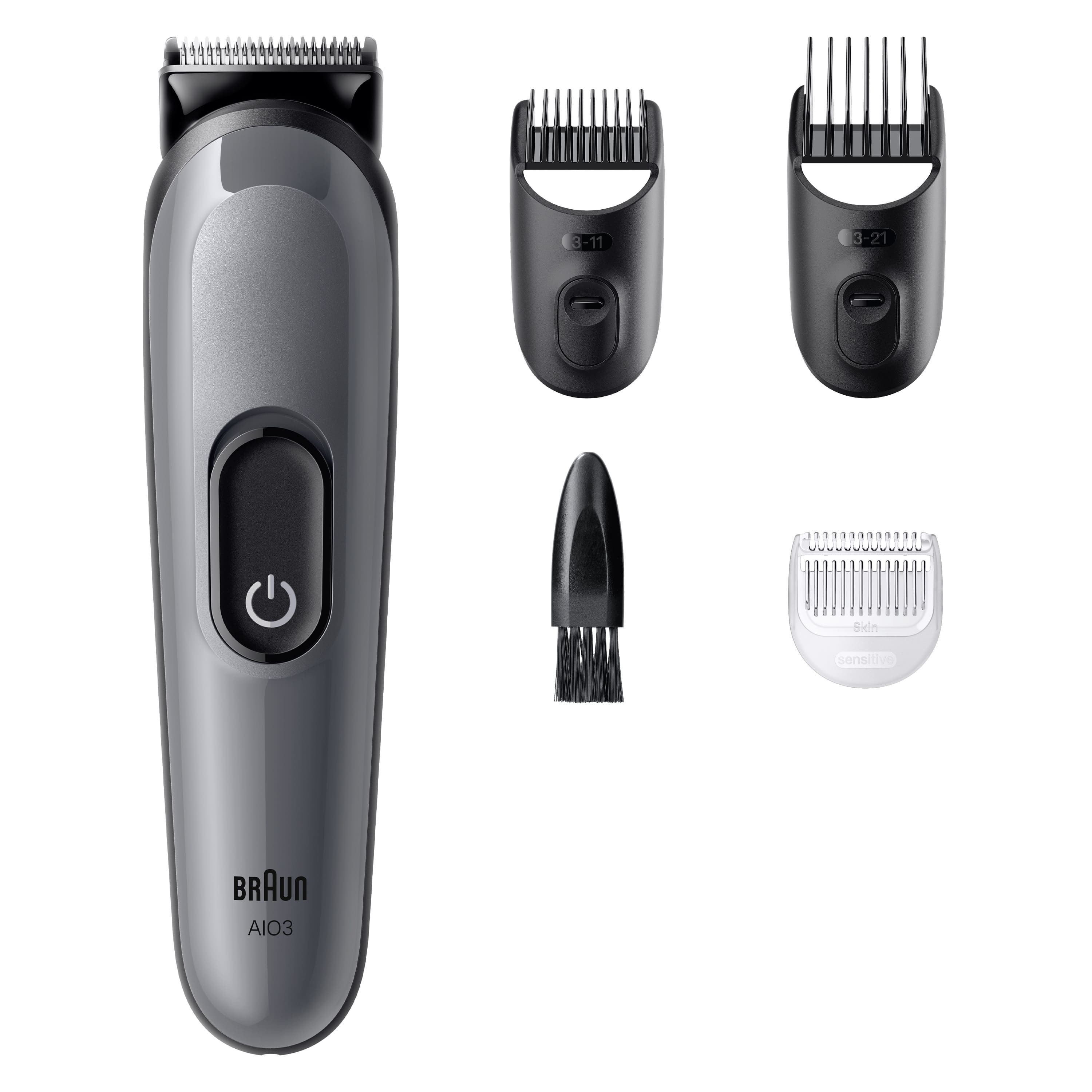 Gri Braun sakal kesme makinesi ve aksesuarları. Kesme başlığı, taraklar, temizleme fırçası ve hassas başlık içerir.