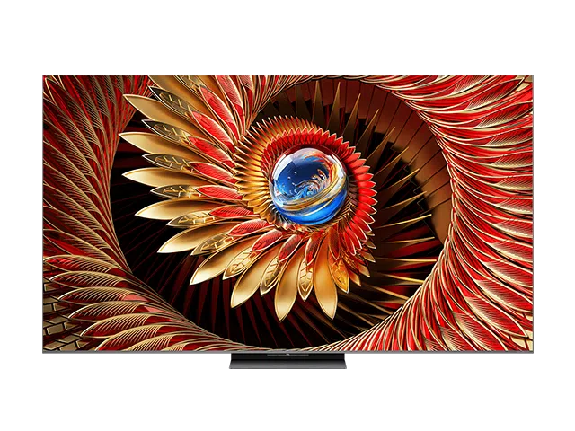Una pantalla de TV muestra un diseño abstracto. Tiene colores rojo, dorado y azul con un patrón arremolinado, floral, sobre un fondo negro.
