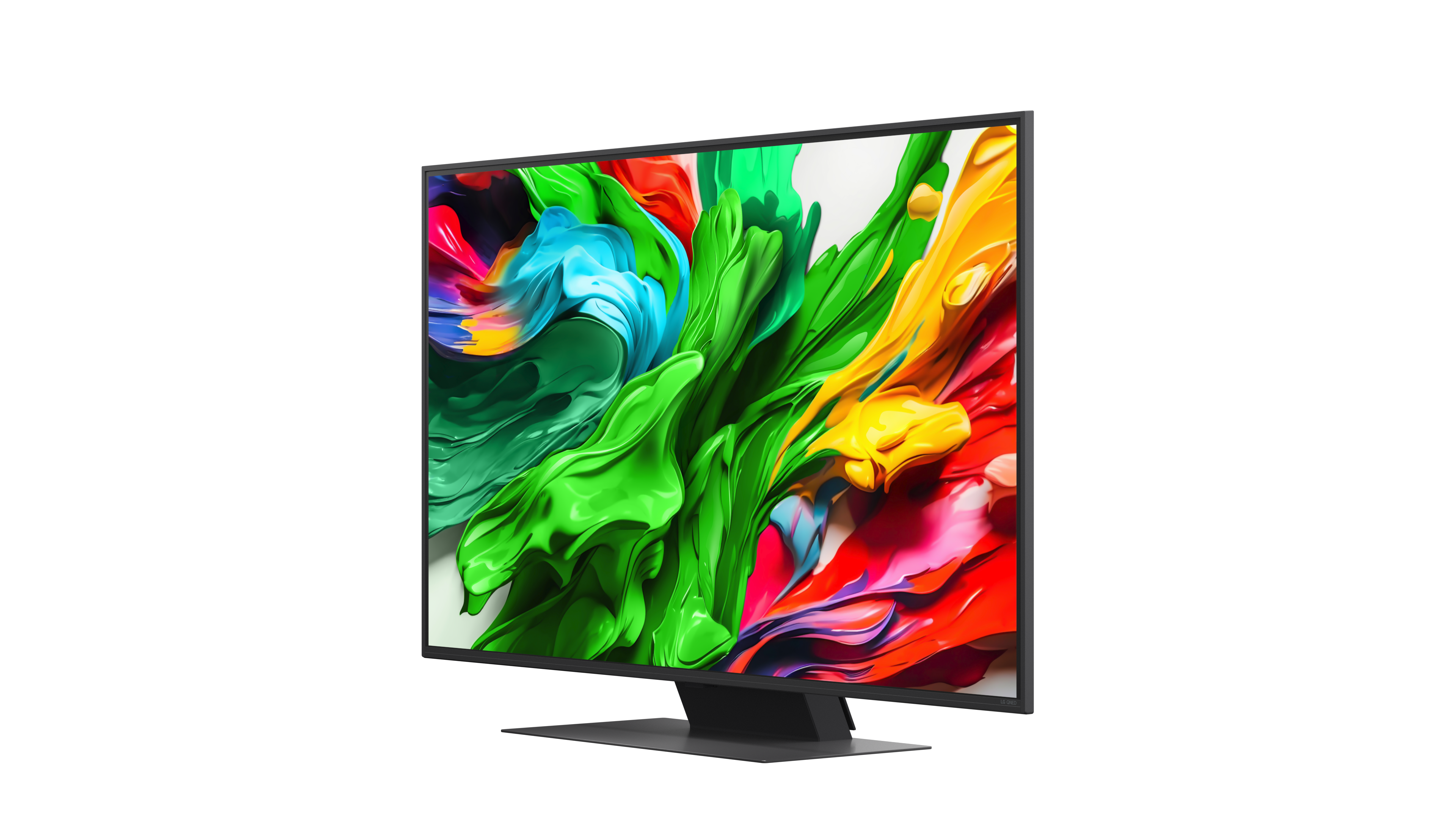 Monitor wyświetla kolorową sztukę abstrakcyjną w żywych odcieniach zieleni, niebieskiego, żółtego i czerwonego. Monitor stoi na czarnym stojaku.