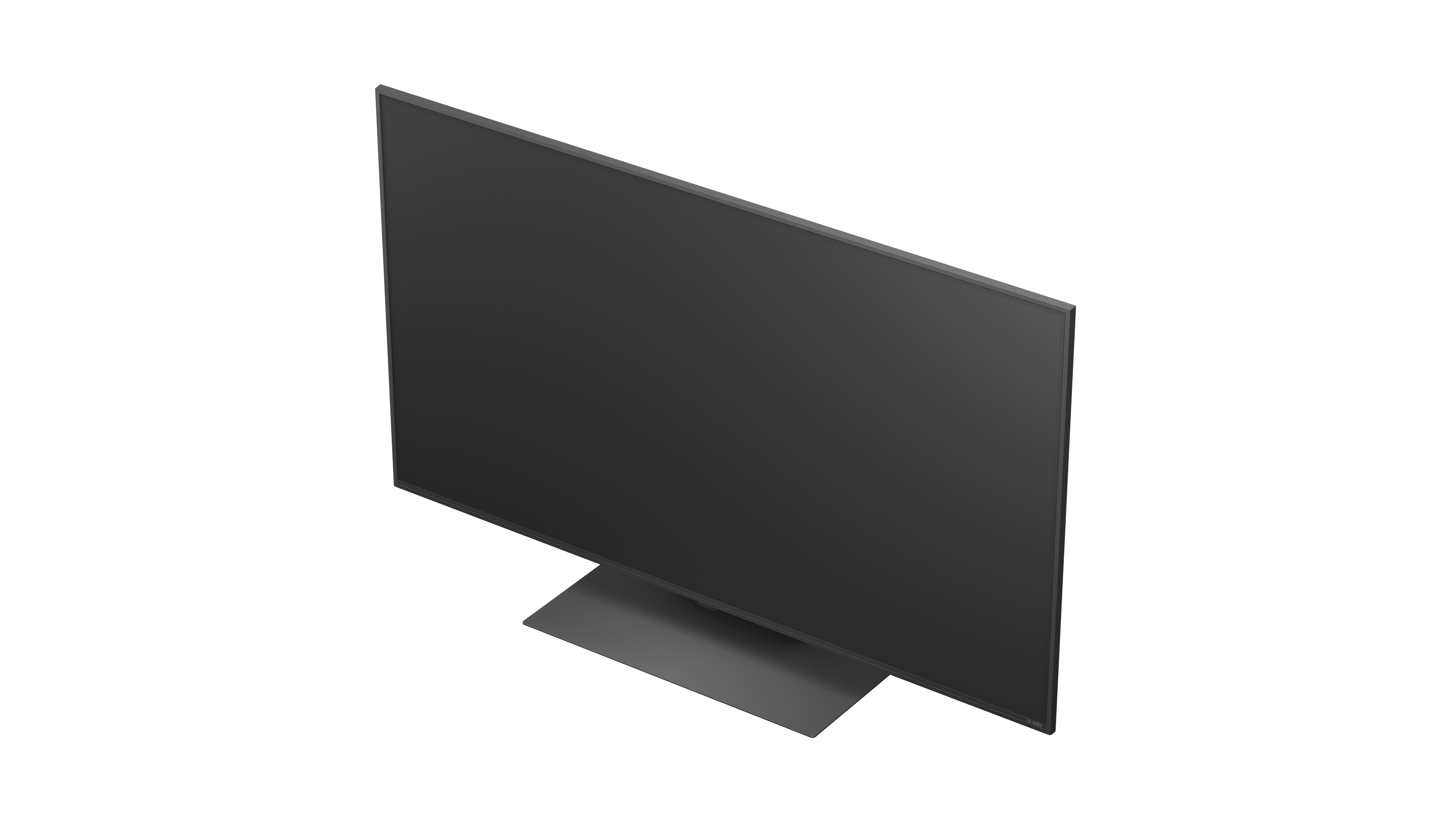 Nowoczesny, ciemnoszary telewizor z płaskim ekranem stoi na szarej podstawie na czarnym tle, telewizor jest ustawiony pod kątem.