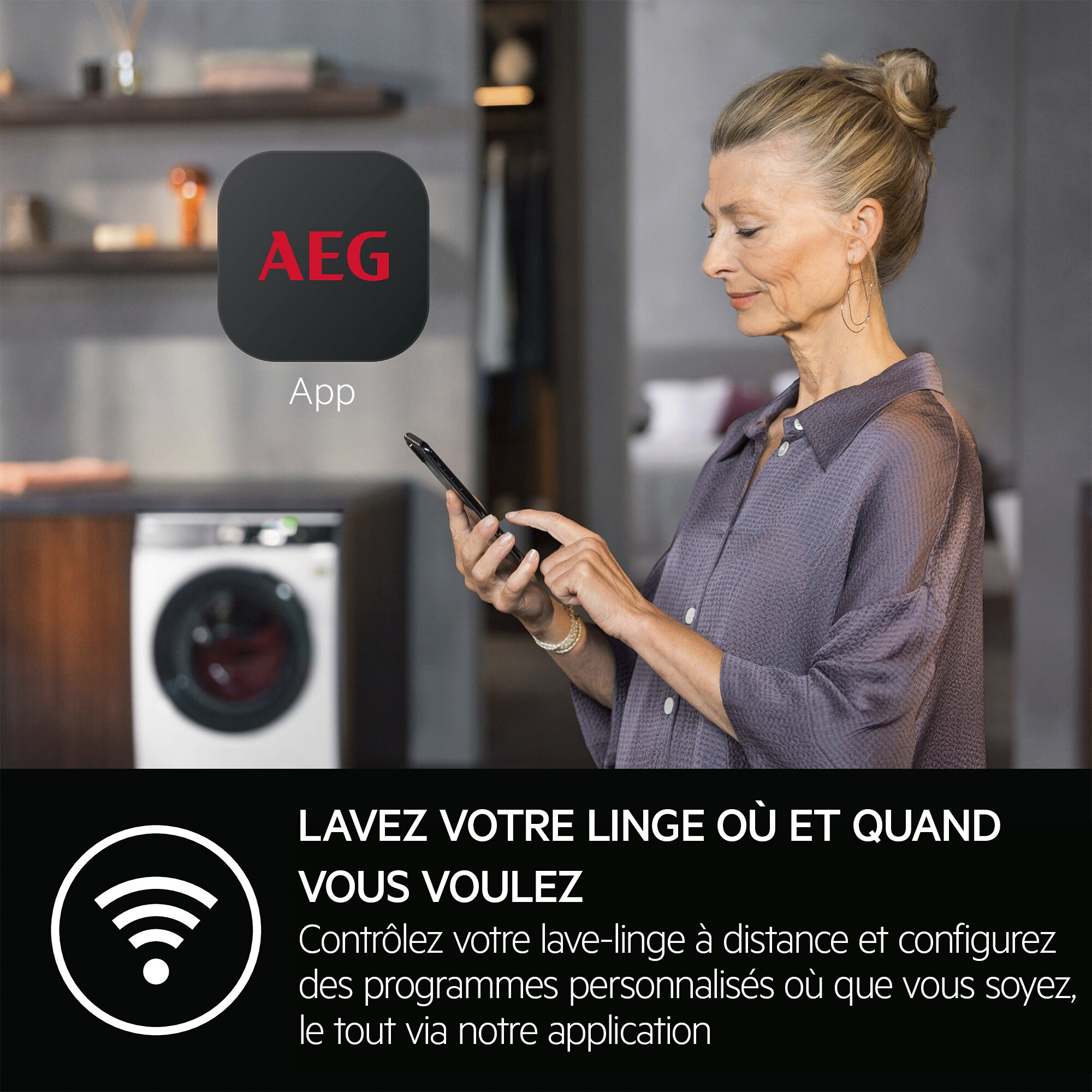 Woman using a phone, AEG app logo, washing machine in the background. Text: Wash your clothes wherever and whenever you want.