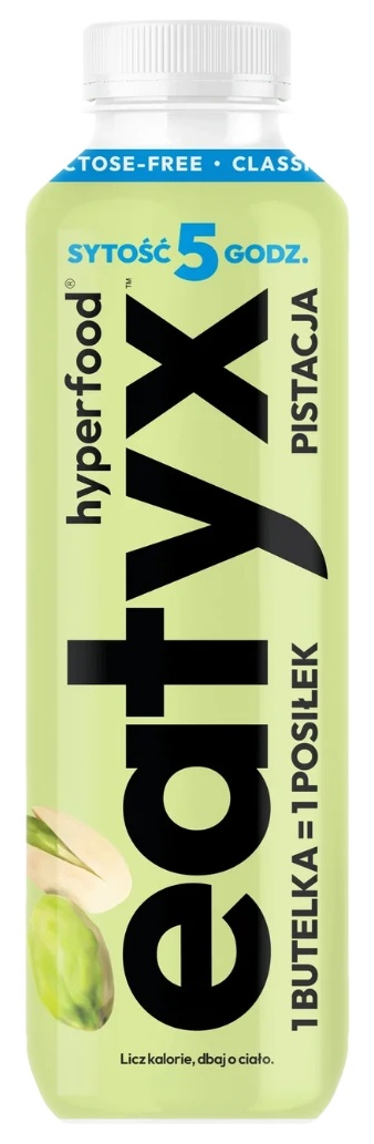 Zielona butelka zamiennika posiłku 'eatvx' o smaku pistacjowym. Z pistacją i tekstem. Bez laktozy.