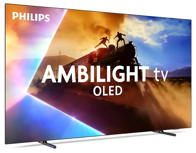 Telewizor OLED Philips Ambilight. Zdjęcie przedstawia pociąg z ludźmi na górze. Ekran ma dynamiczne kolory i tekst AMBILIGHT tv OLED.