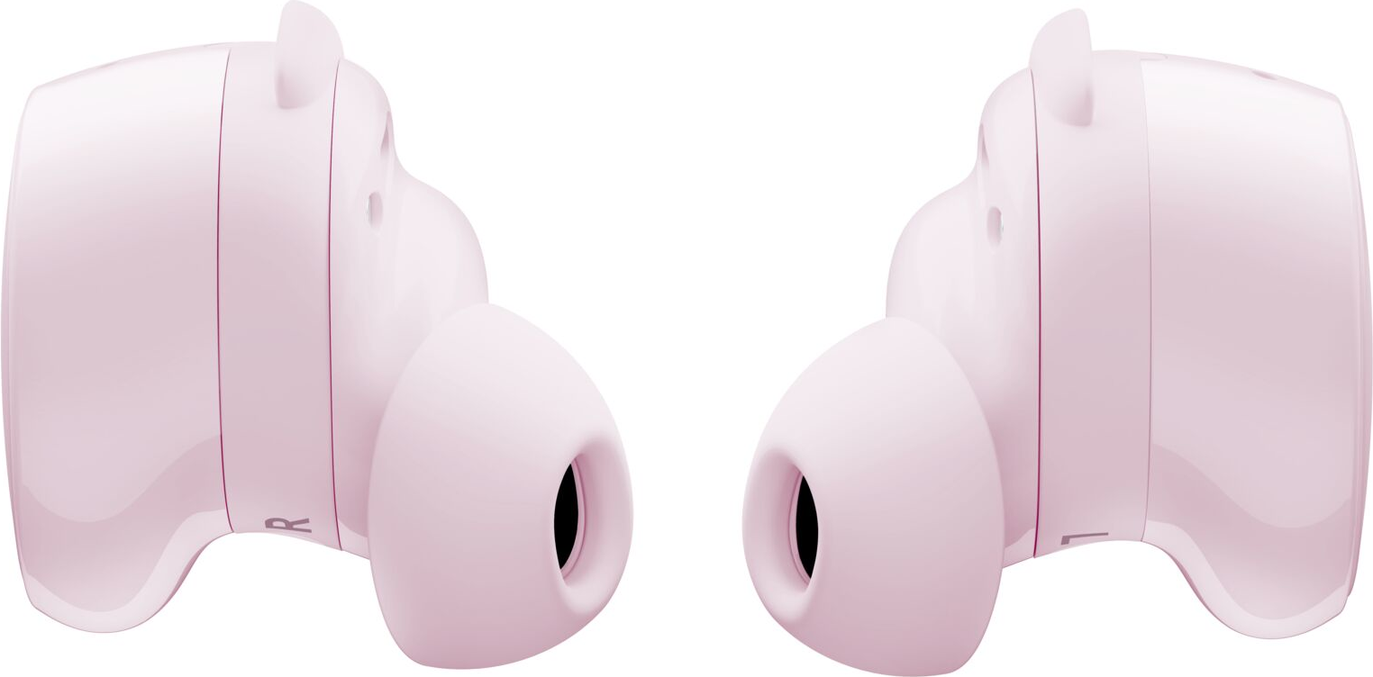 Due auricolari wireless rosa su sfondo bianco. Ogni auricolare ha una piccola aletta e un puntale in silicone.