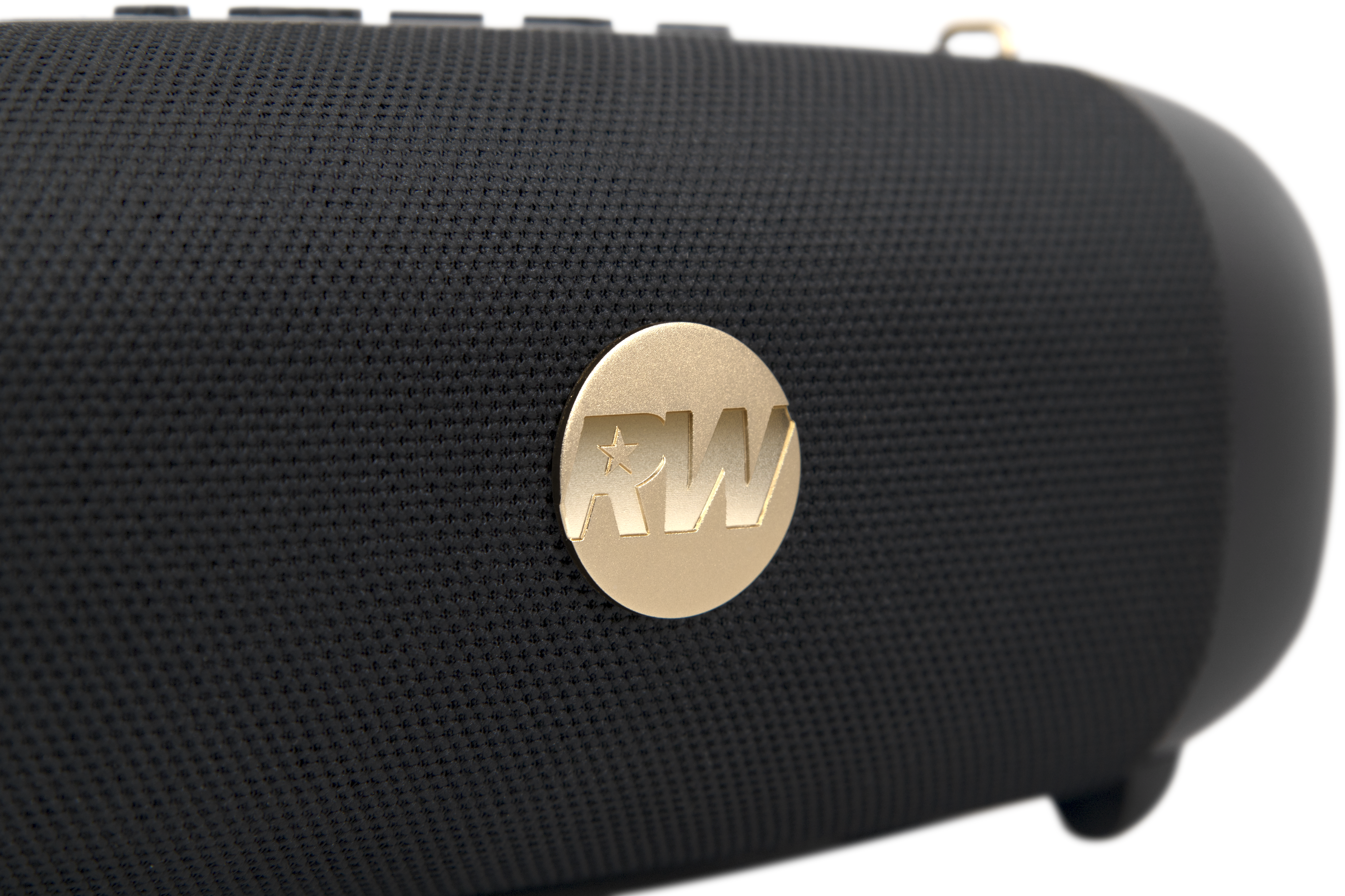 Haut-parleur cylindrique noir avec logo RW doré. Le haut-parleur a une texture en maille et est sur fond blanc.