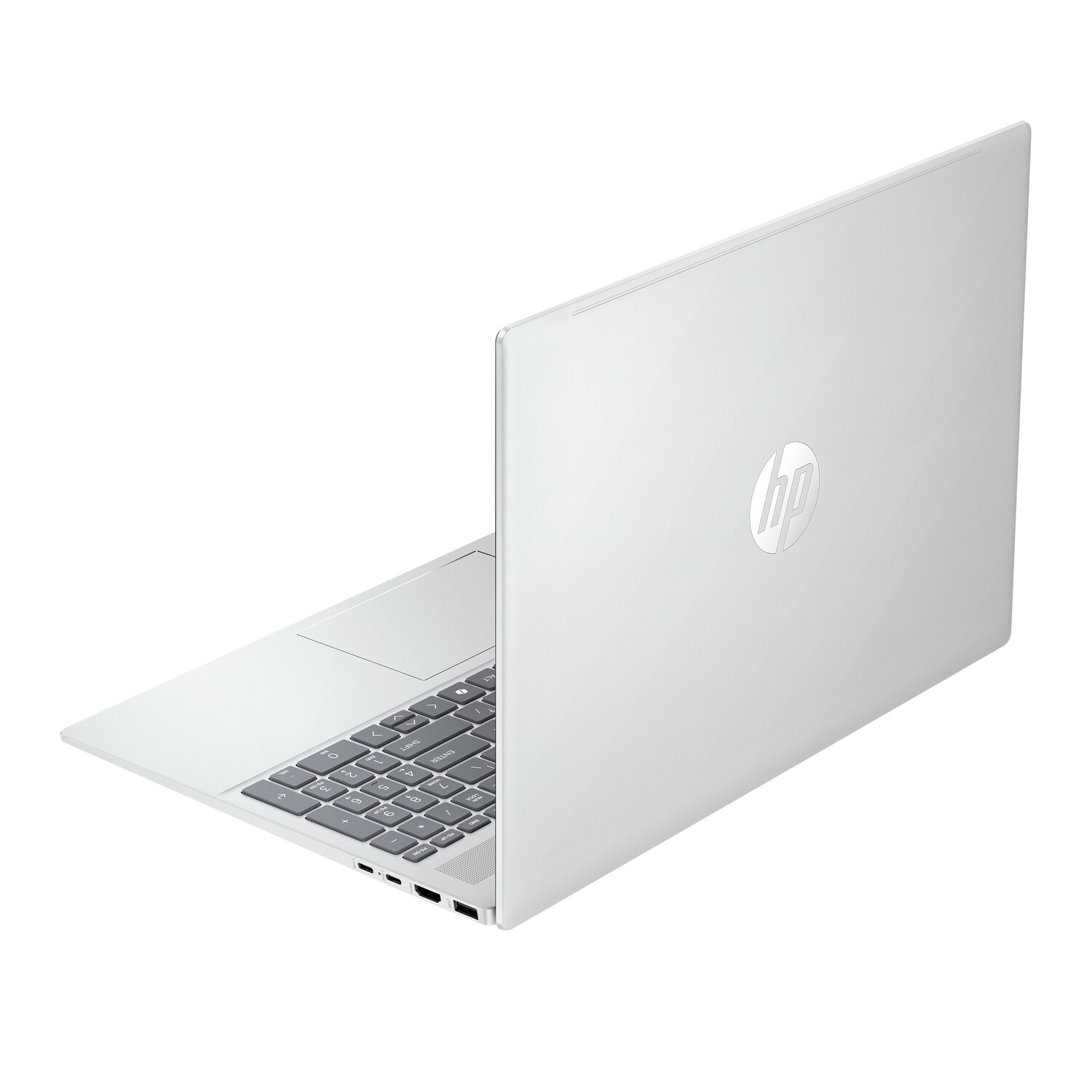 A silver HP laptop is open, showing the keyboard and screen. The HP logo is visible on the closed lid.